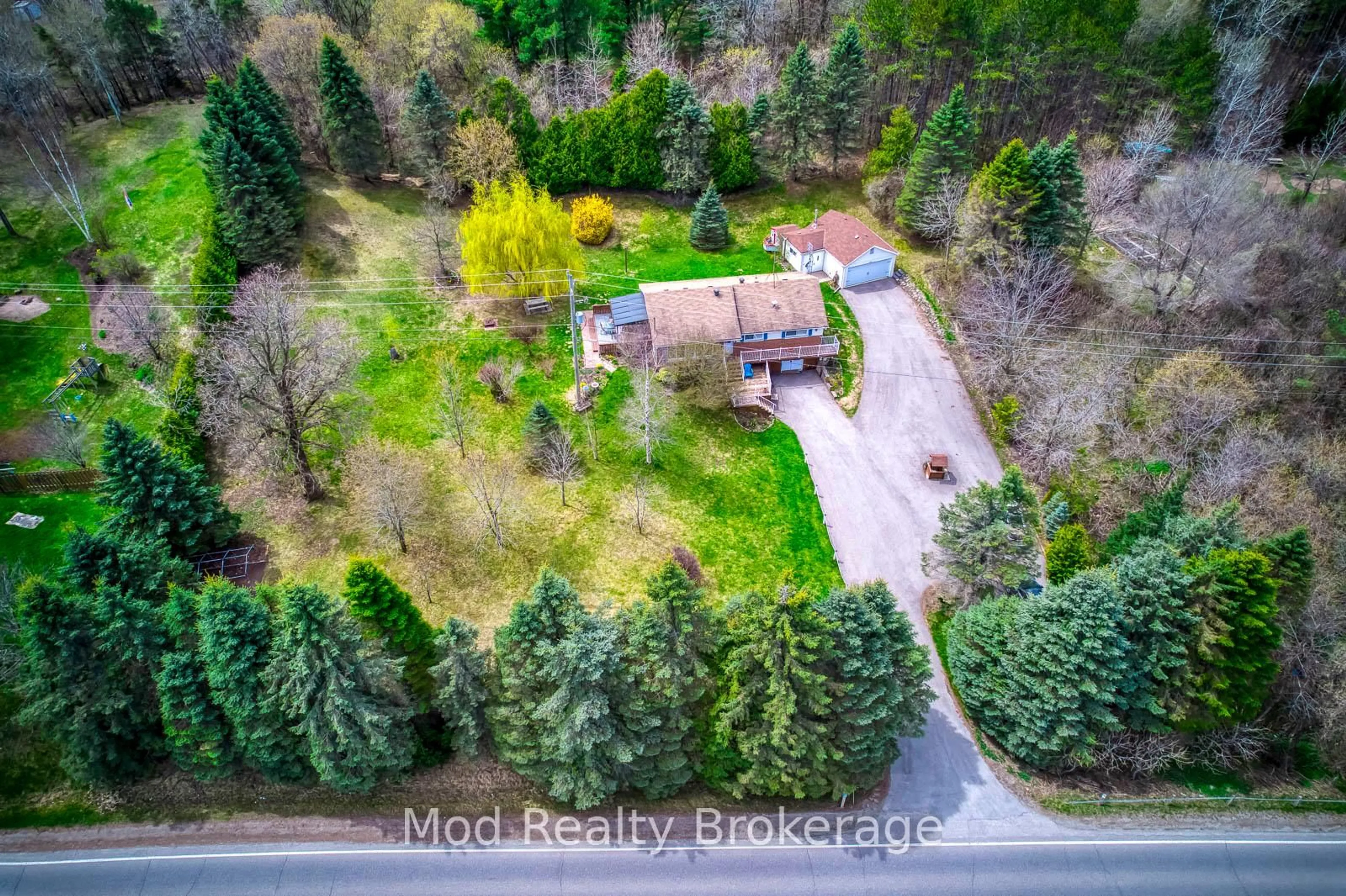 A pic from outside/outdoor area/front of a property/back of a property/a pic from drone, forest/trees view for 12638 4 Line, Halton Hills Ontario L7J 2M1