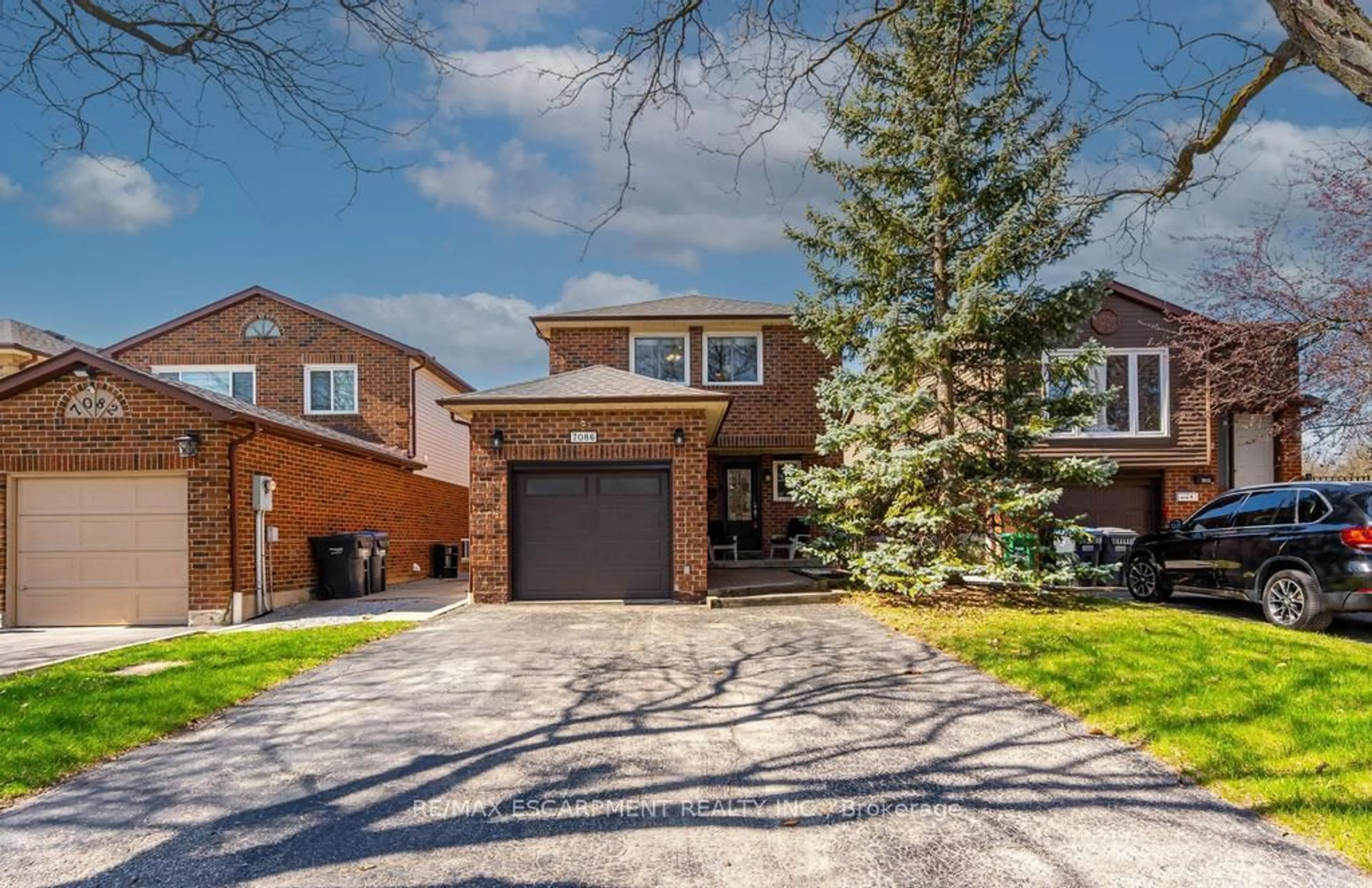 Home with brick exterior material, street for 7086 Tamar Mews, Mississauga Ontario L5N 3S2