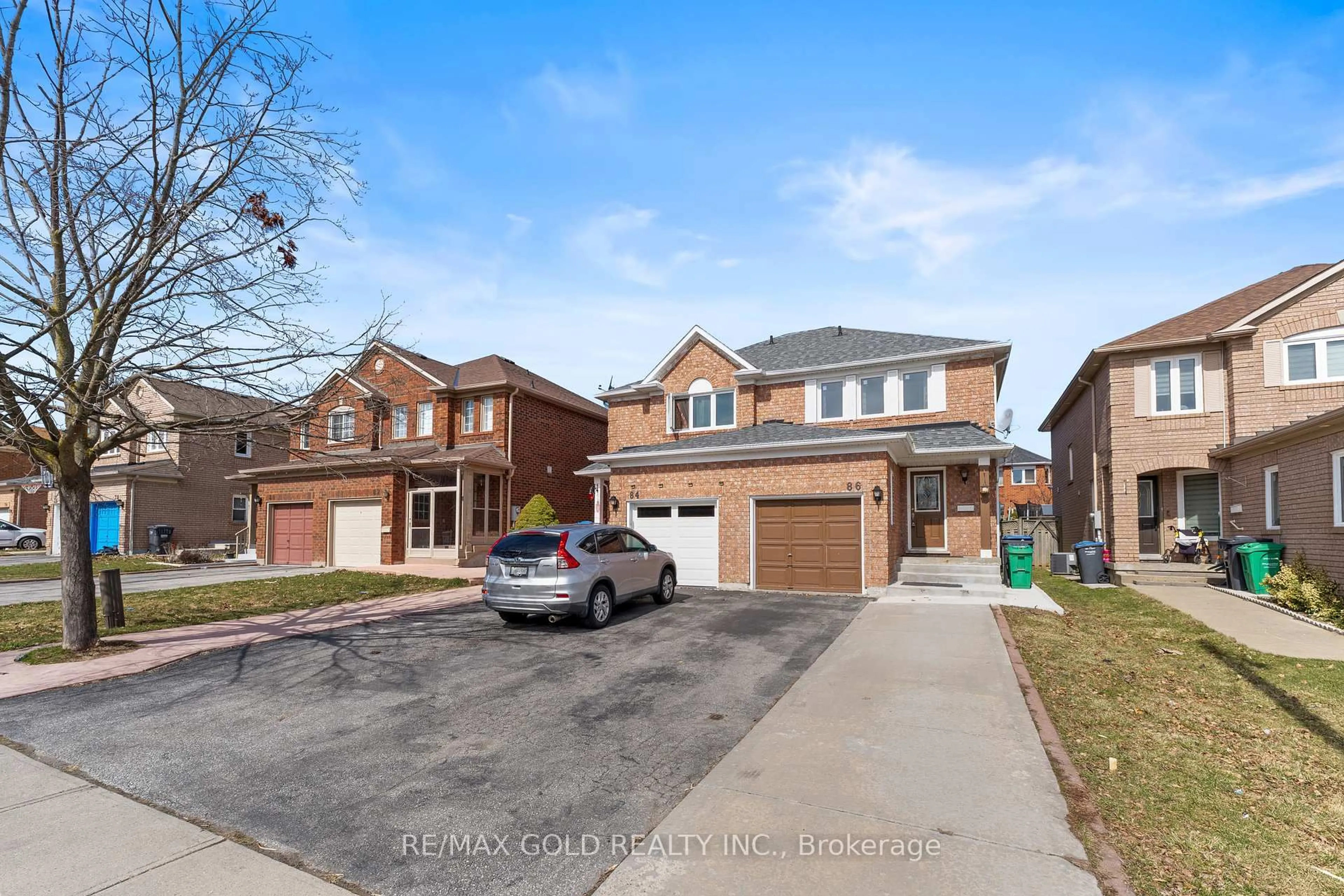Home with brick exterior material, street for 86 Oatfield Rd, Brampton Ontario L6R 1Y5