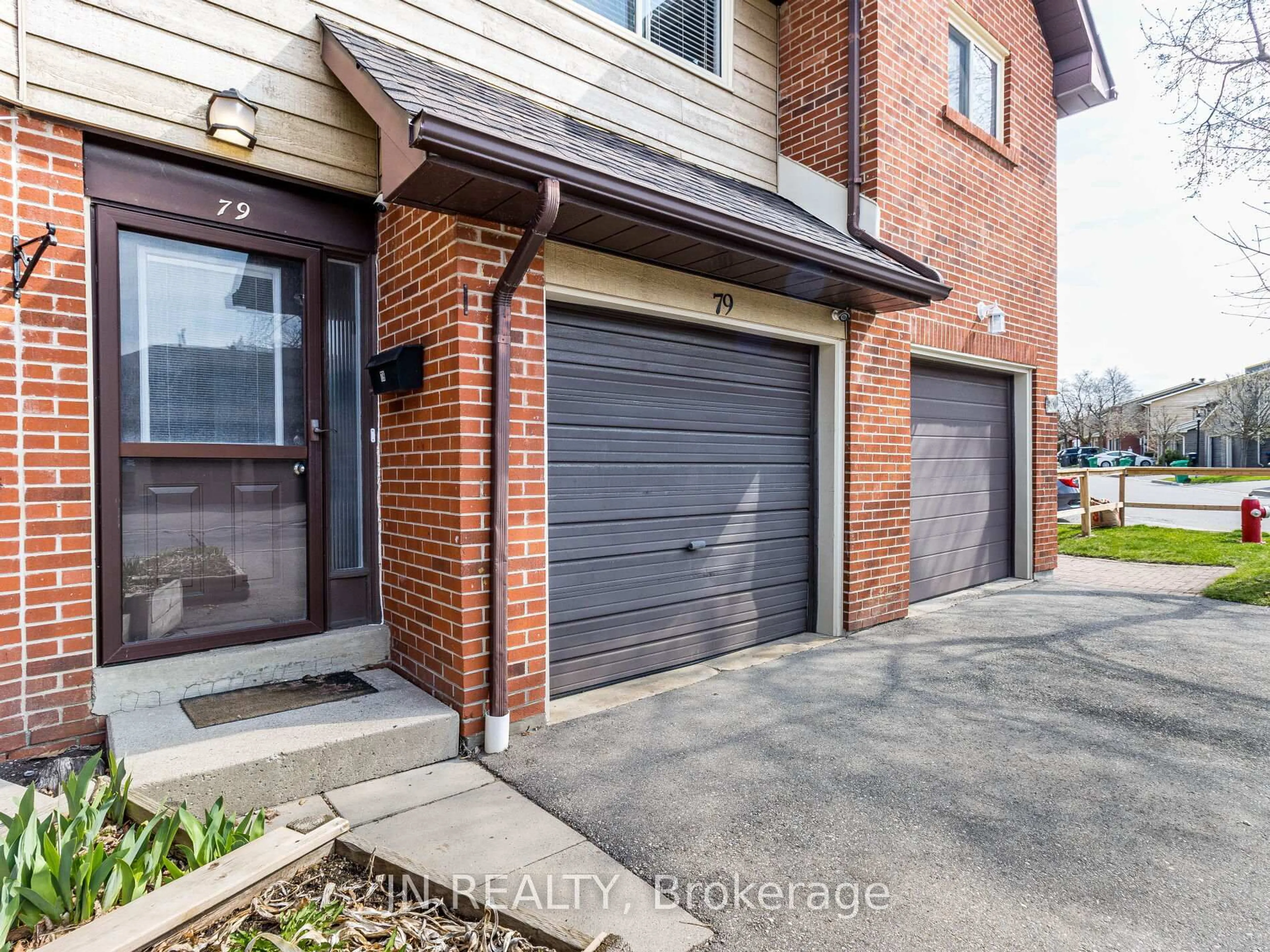 Home with brick exterior material, street for 79 Foster Cres #79, Brampton Ontario L6V 3M8