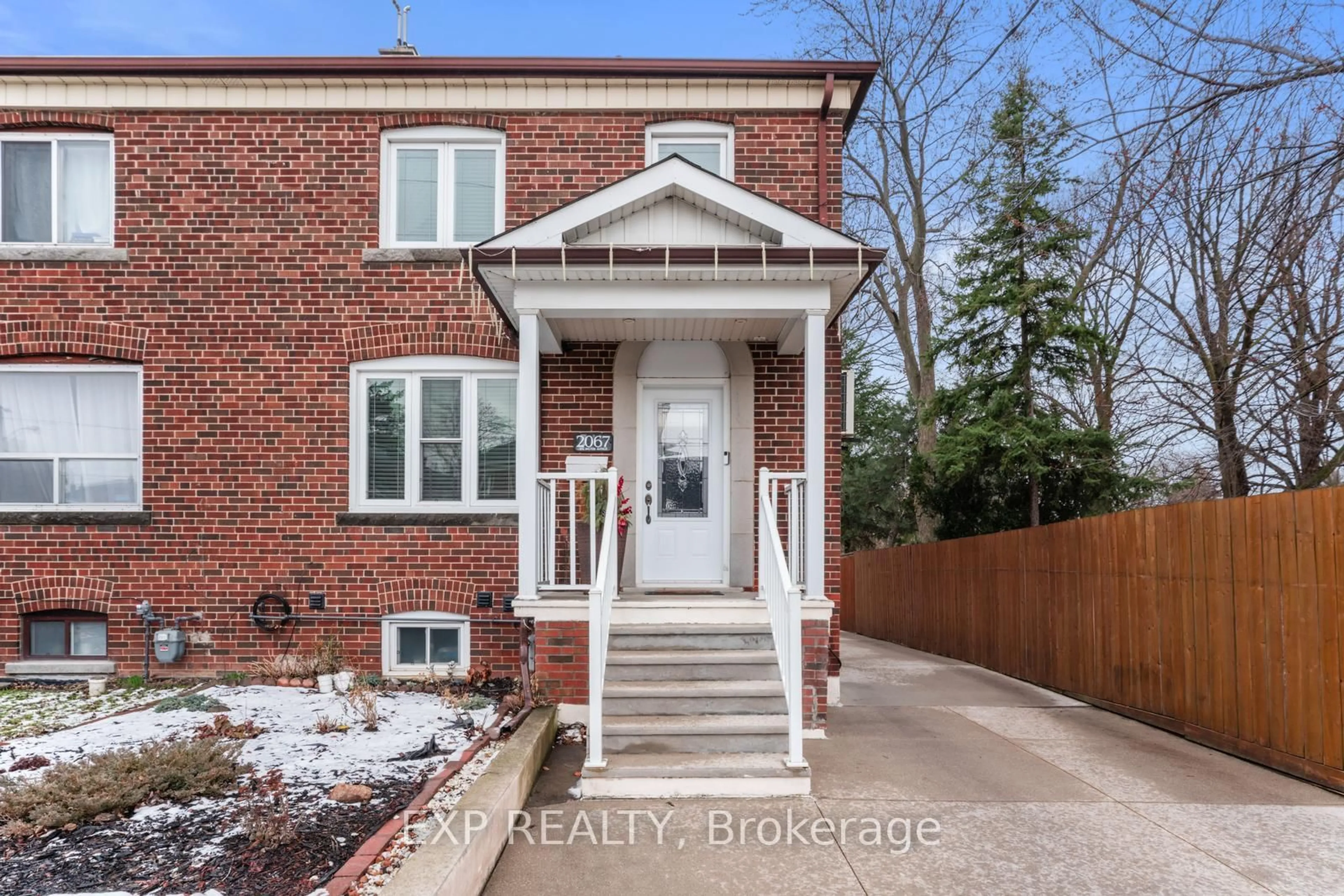 Home with brick exterior material, street for 2067 Eglinton Ave, Toronto Ontario M6E 2K6