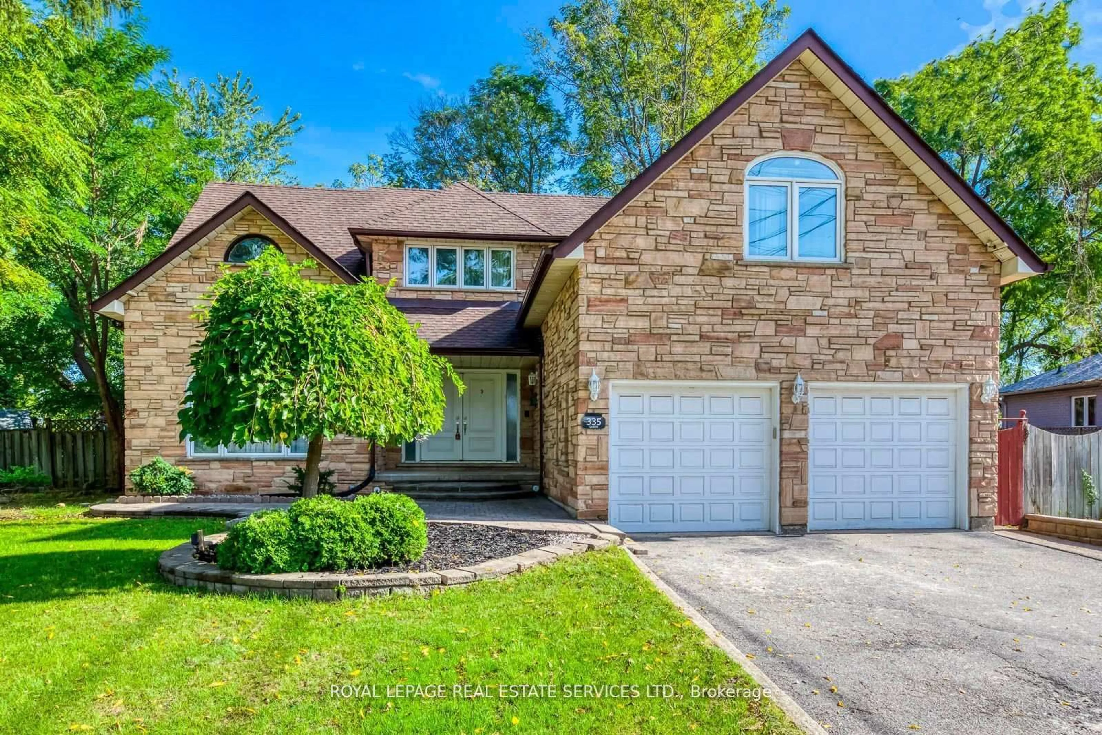 Home with brick exterior material, street for 335 Queen St, Mississauga Ontario L5M 1M3