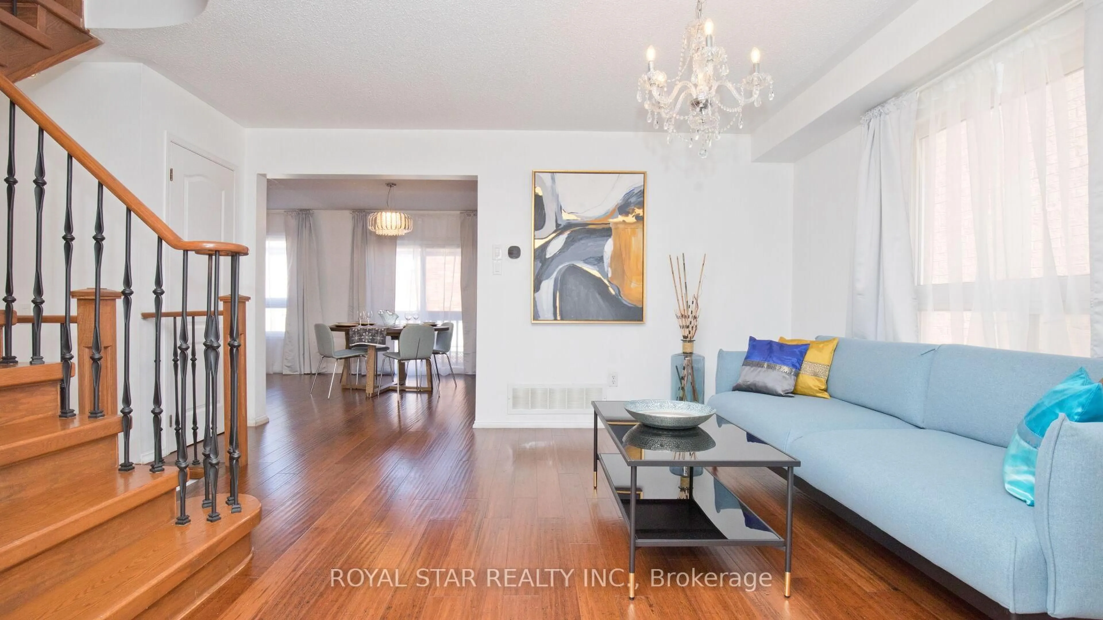 Living room with furniture, wood/laminate floor for 13 Waterdale Rd, Brampton Ontario L7A 1S7