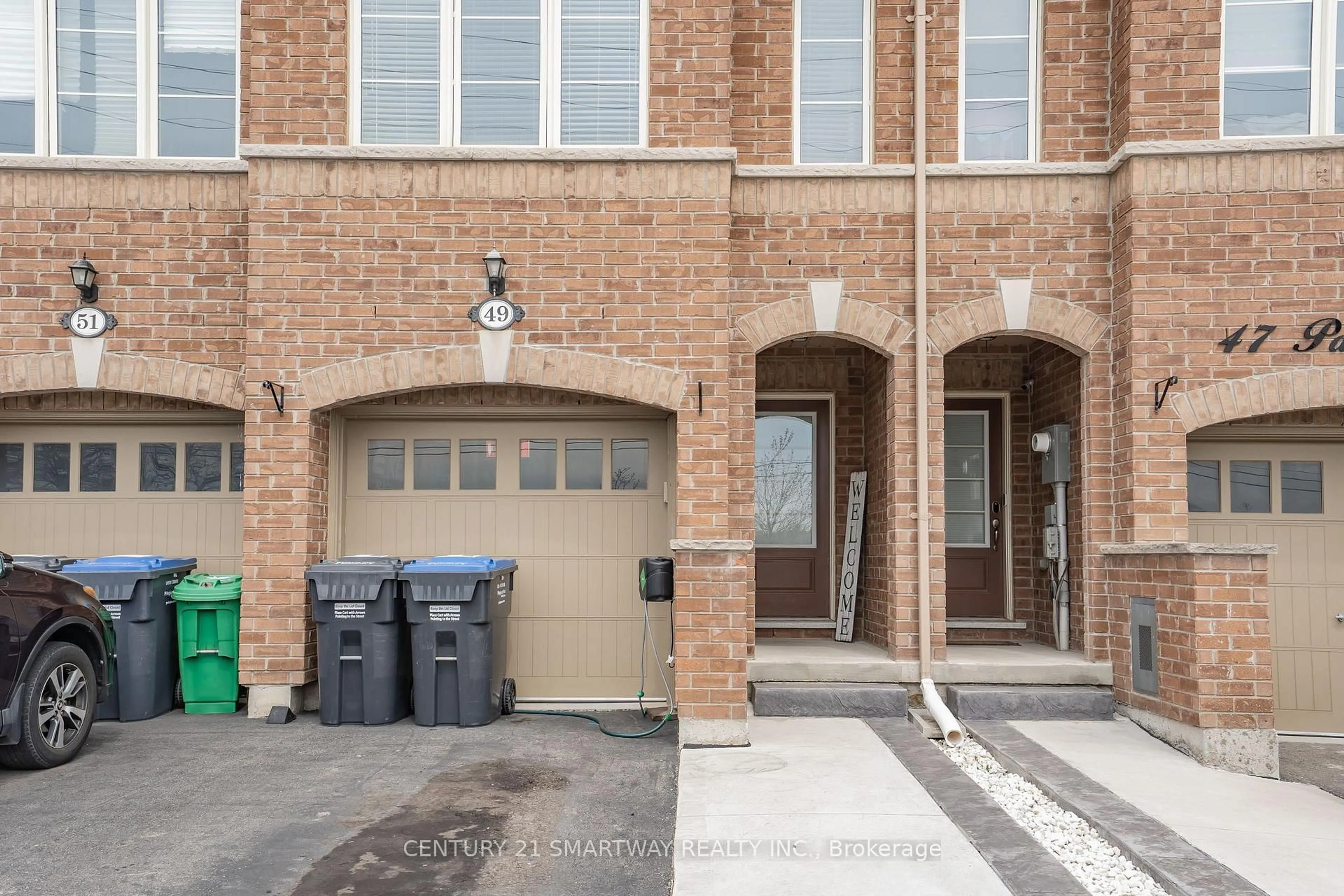 Home with brick exterior material, street for 49 Padbury Tr, Brampton Ontario L7A 0B2
