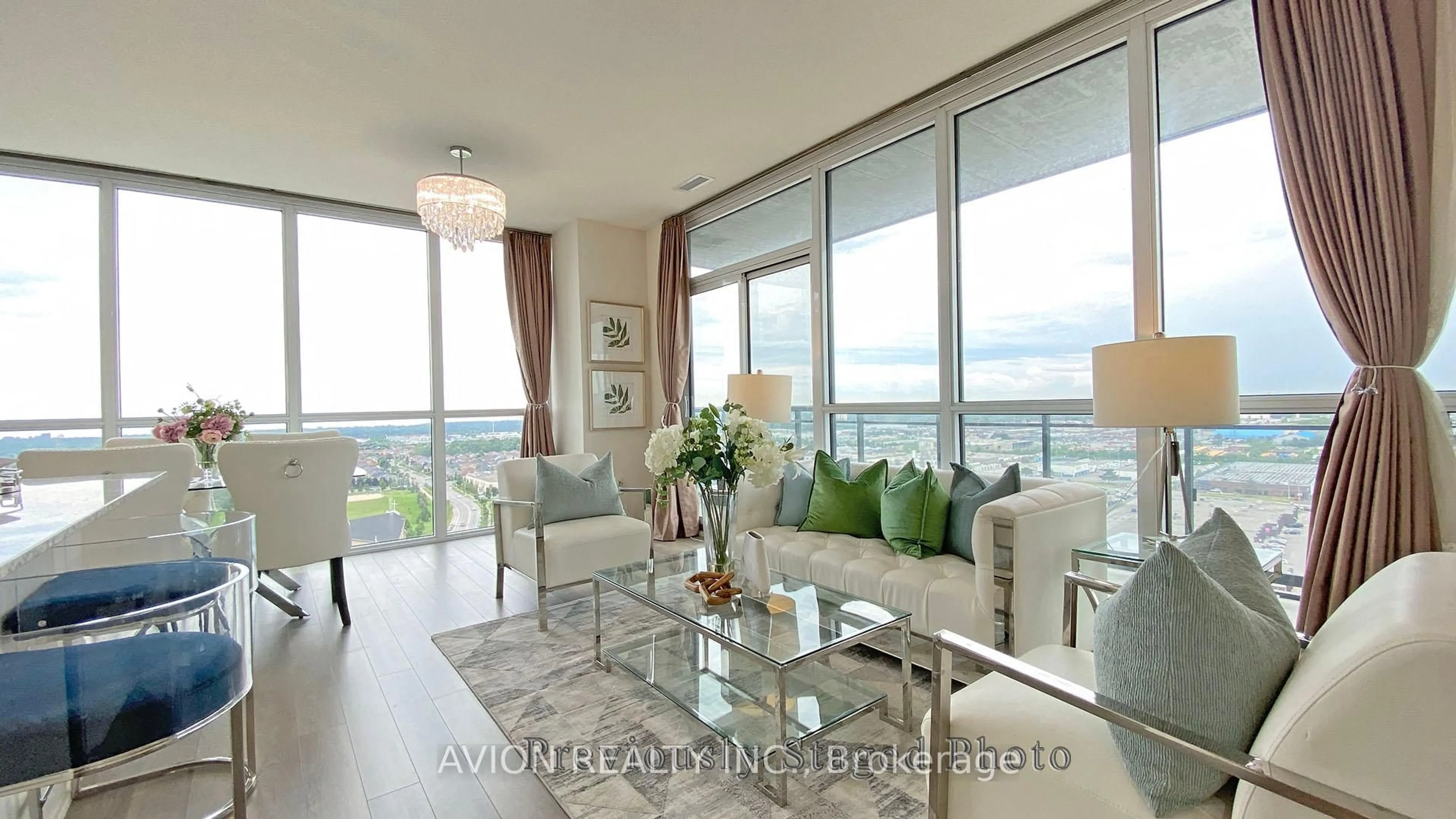Living room with furniture, wood/laminate floor for 3975 Grand Park Dr #1704, Mississauga Ontario L5B 0K4