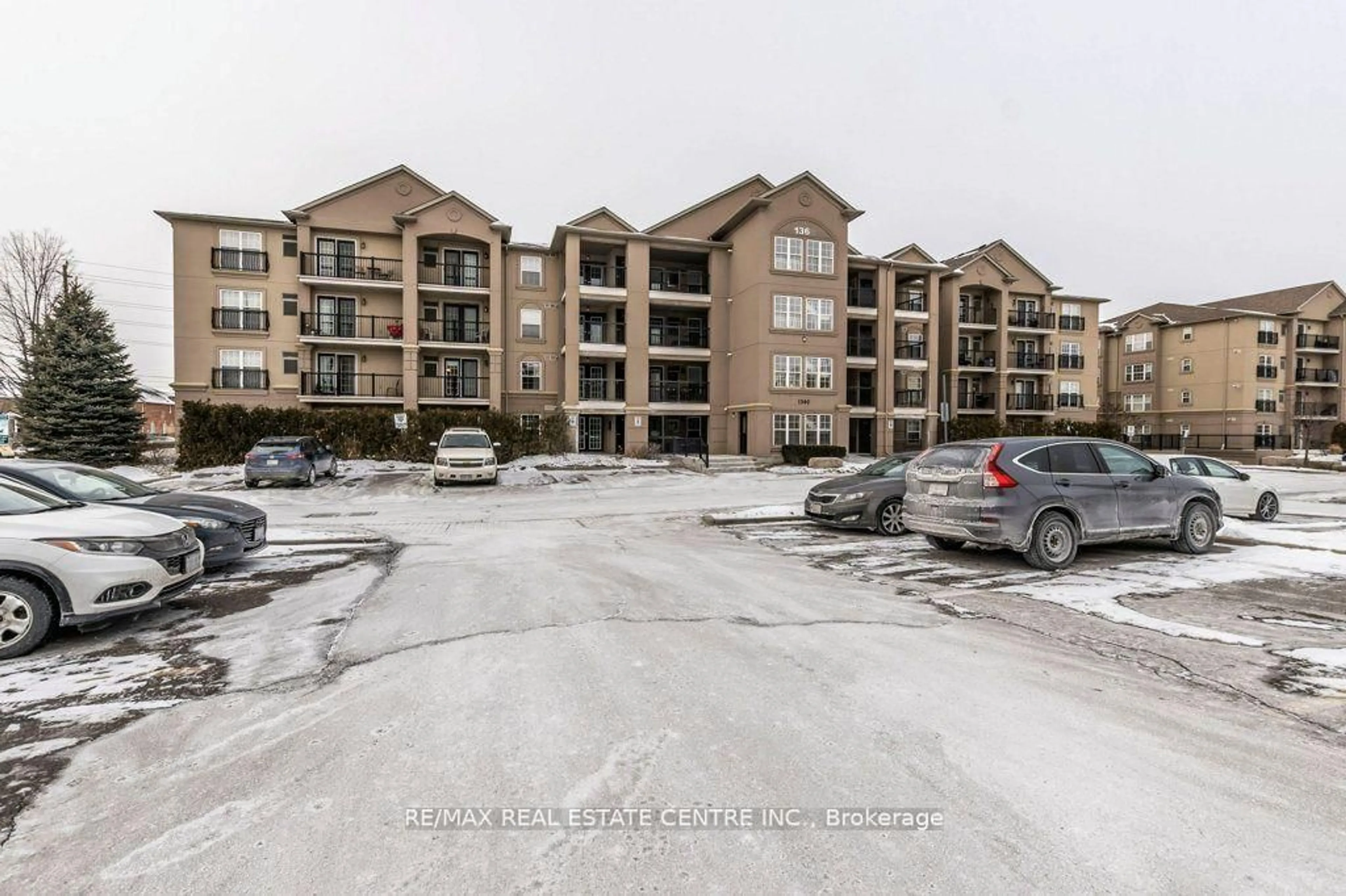 A pic from outside/outdoor area/front of a property/back of a property/a pic from drone, unknown for 1360 Main St #409, Milton Ontario L9T 7S5