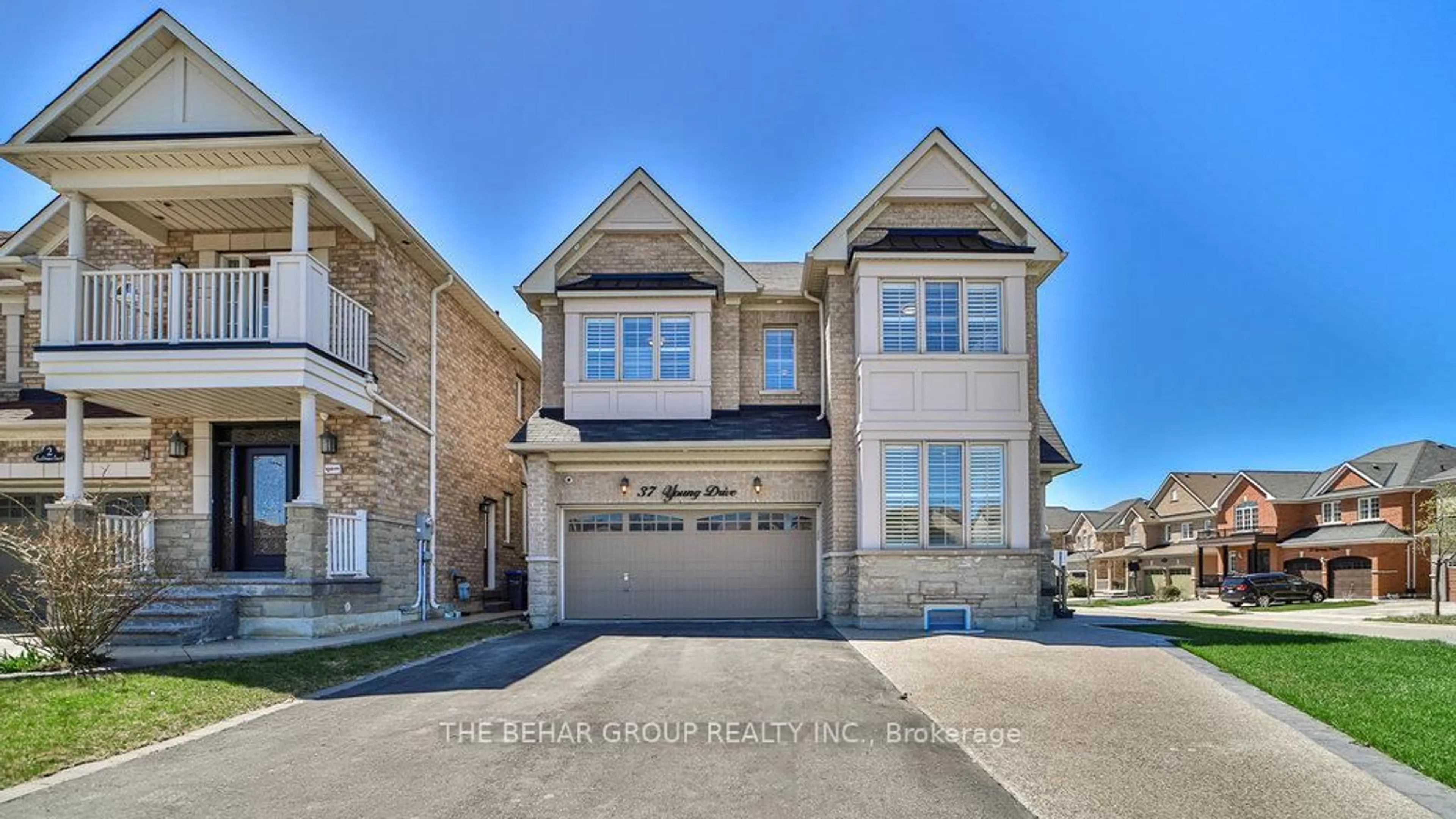 Home with brick exterior material, street for 37 Young Dr, Brampton Ontario L6Y 0P4