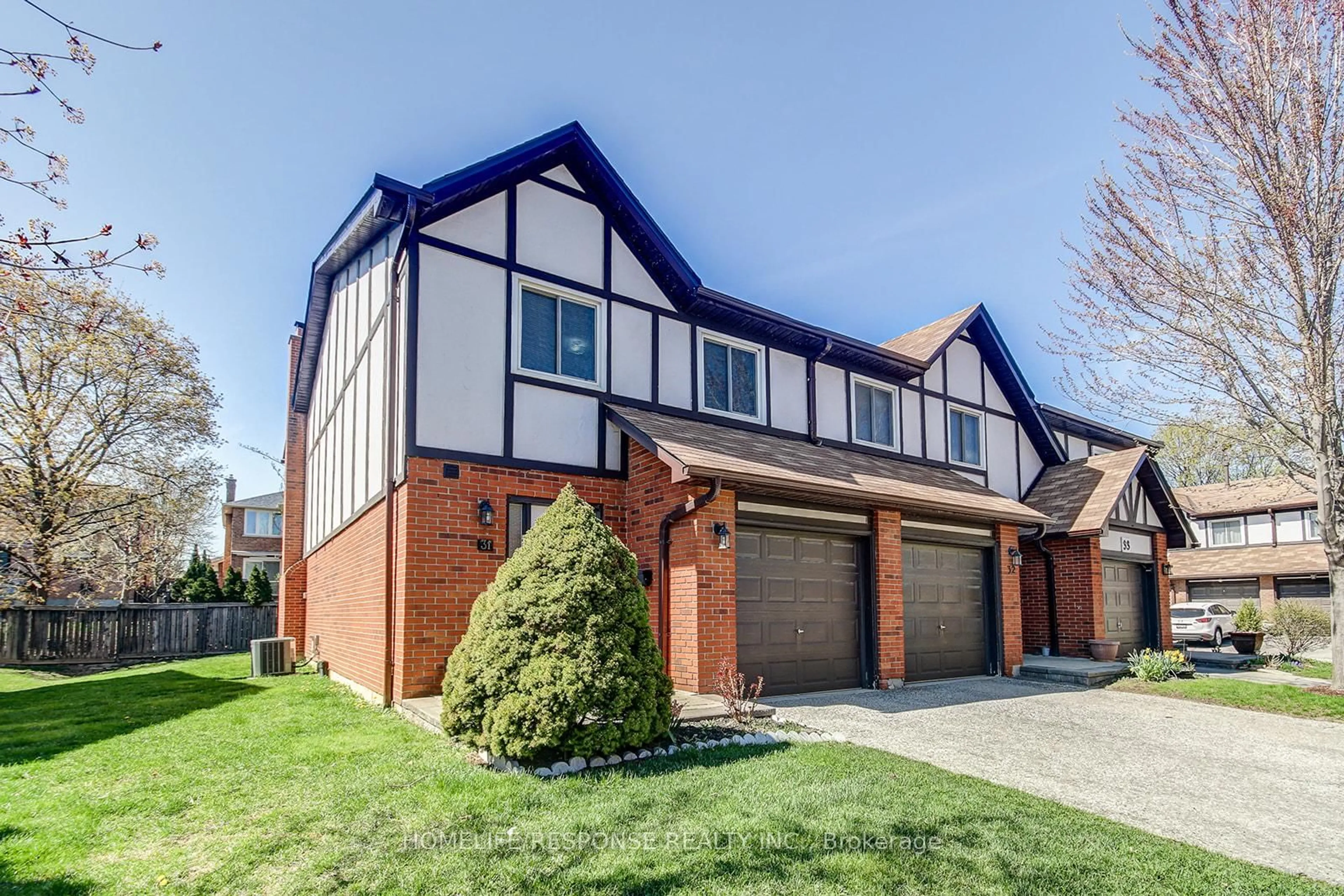 Home with brick exterior material, street for 1755 RATHBURN Rd #31, Mississauga Ontario L4W 2M8