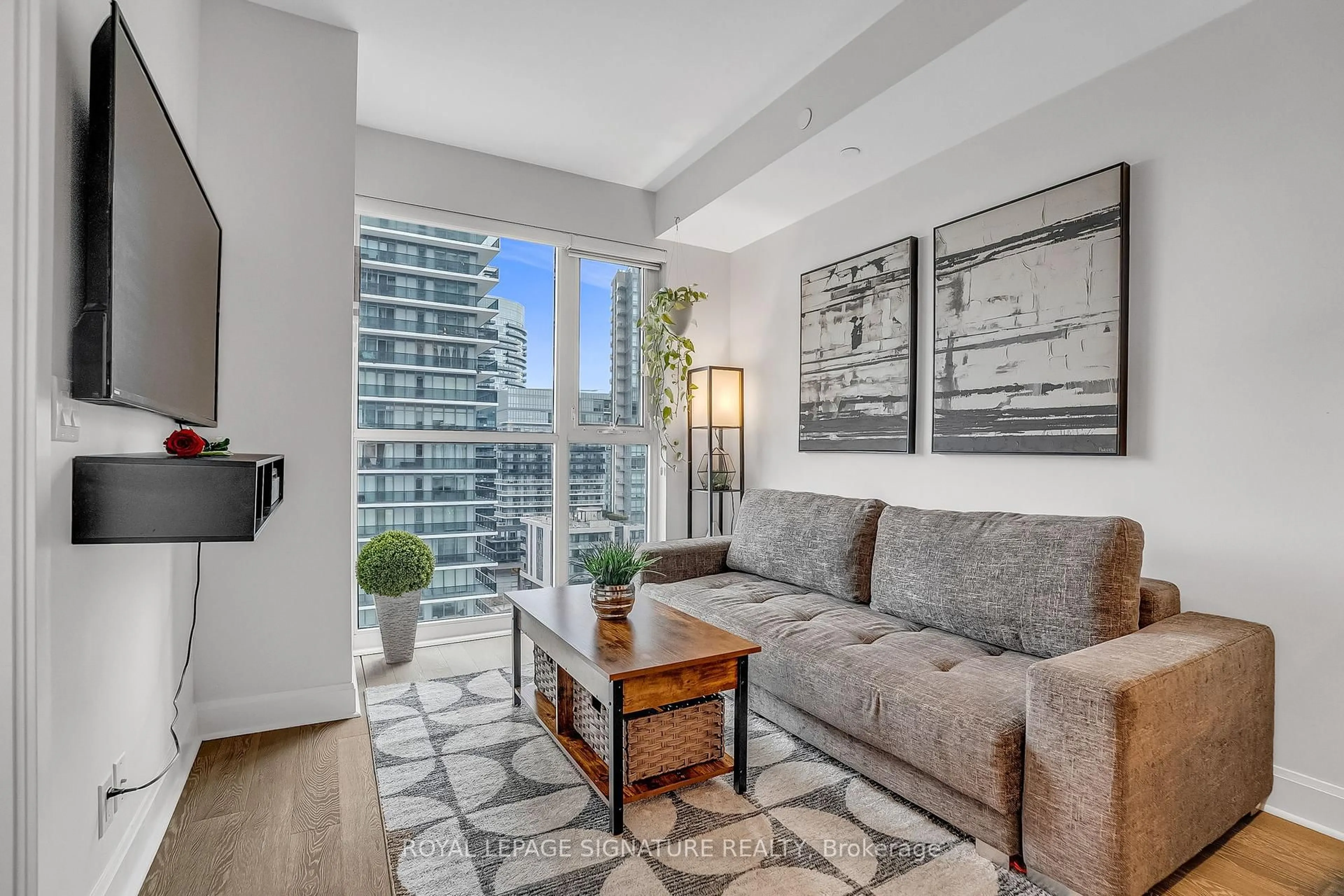 Living room with furniture, unknown for 33 Shore Breeze Dr #1105, Toronto Ontario M8V 0G1