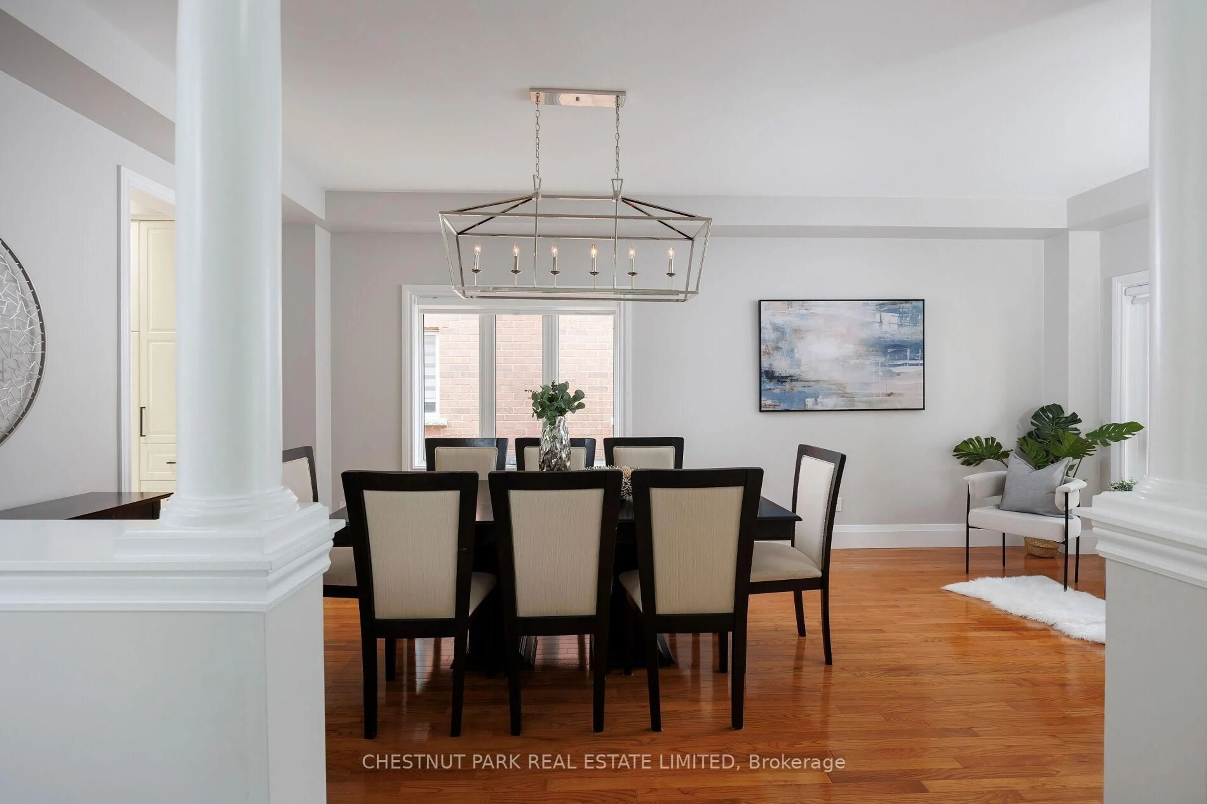 Dining room, wood/laminate floor for 22 Carmel Cres, Brampton Ontario L6P 1Y1