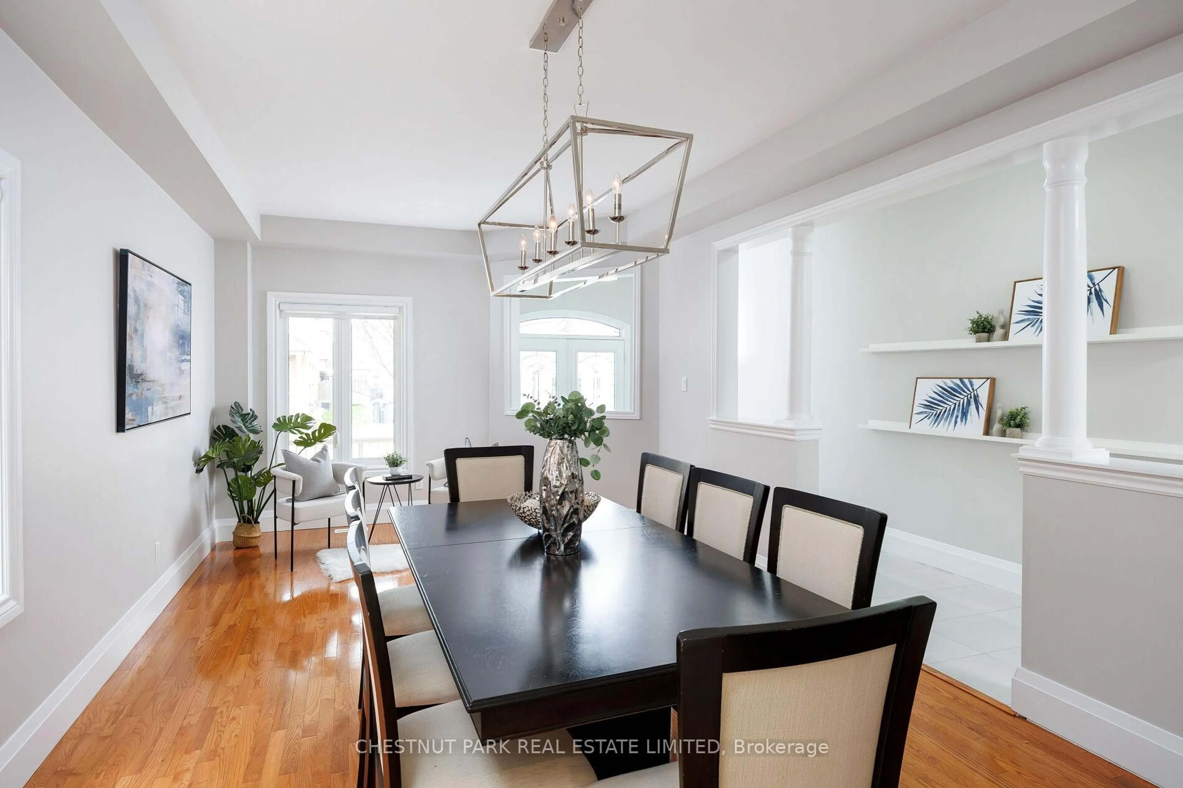 Dining room, wood/laminate floor for 22 Carmel Cres, Brampton Ontario L6P 1Y1