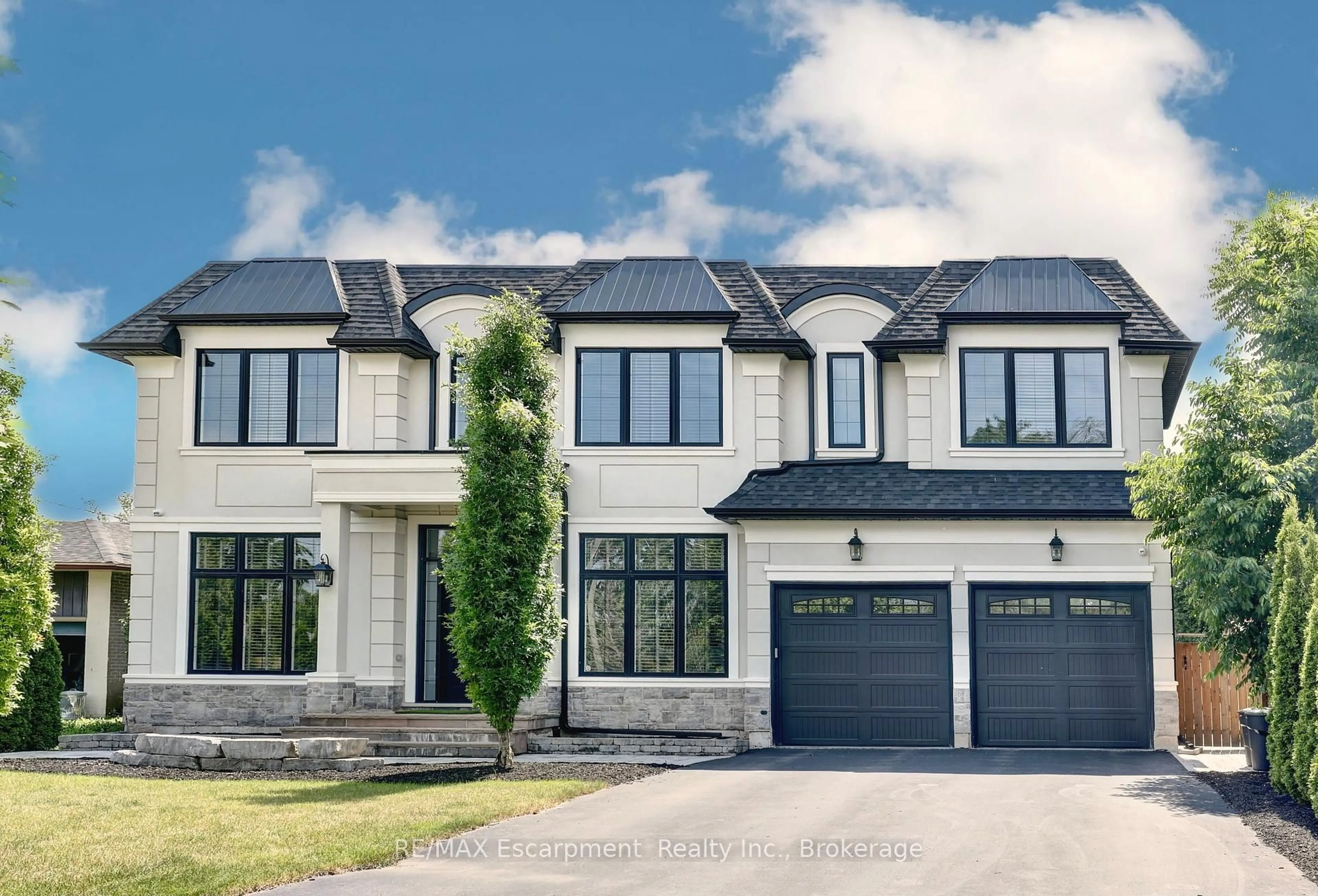 Home with brick exterior material, street for 402 Tennyson Dr, Oakville Ontario L6L 3Z1