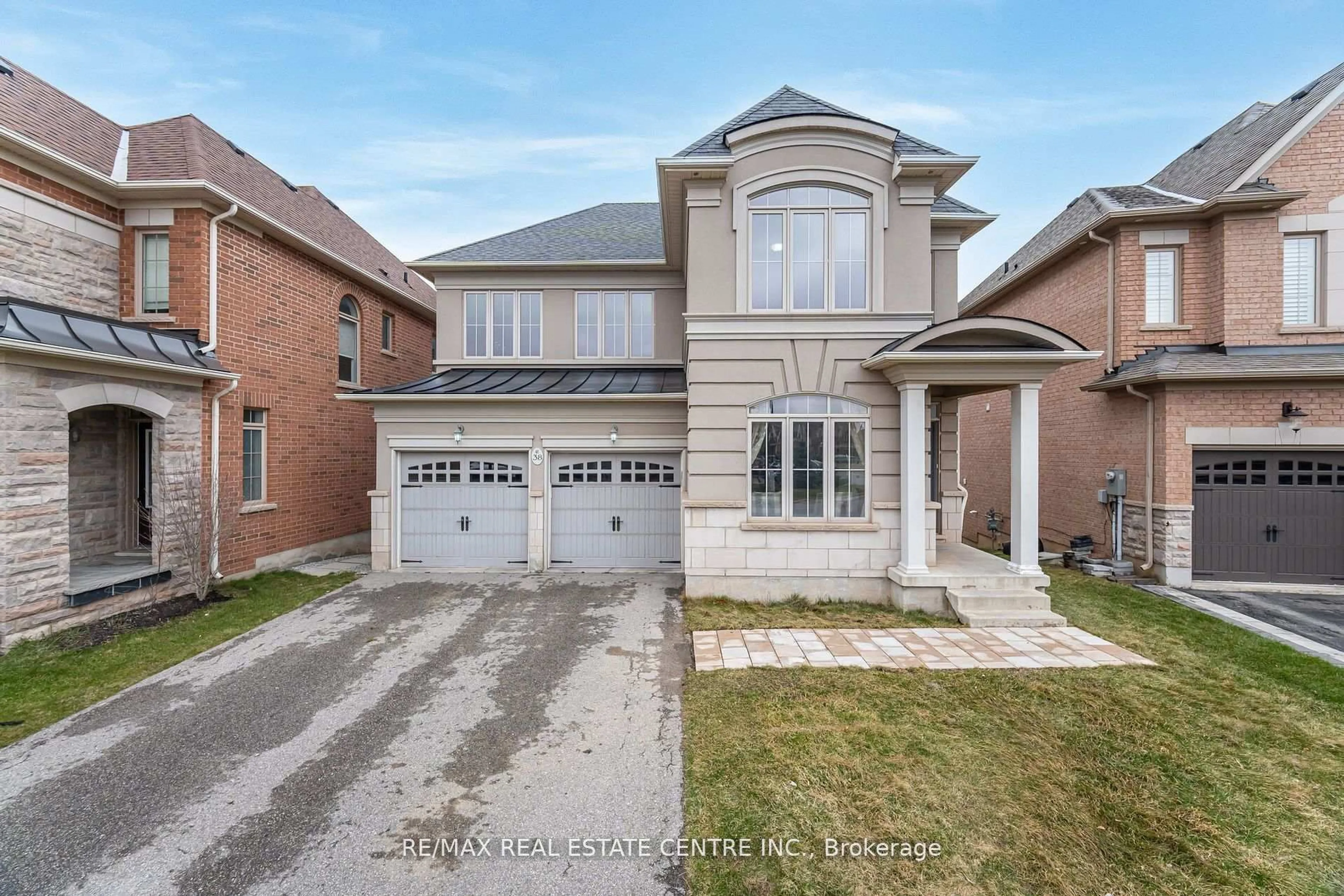 Home with brick exterior material, street for 38 Junetown Circ, Brampton Ontario L6X 0X7