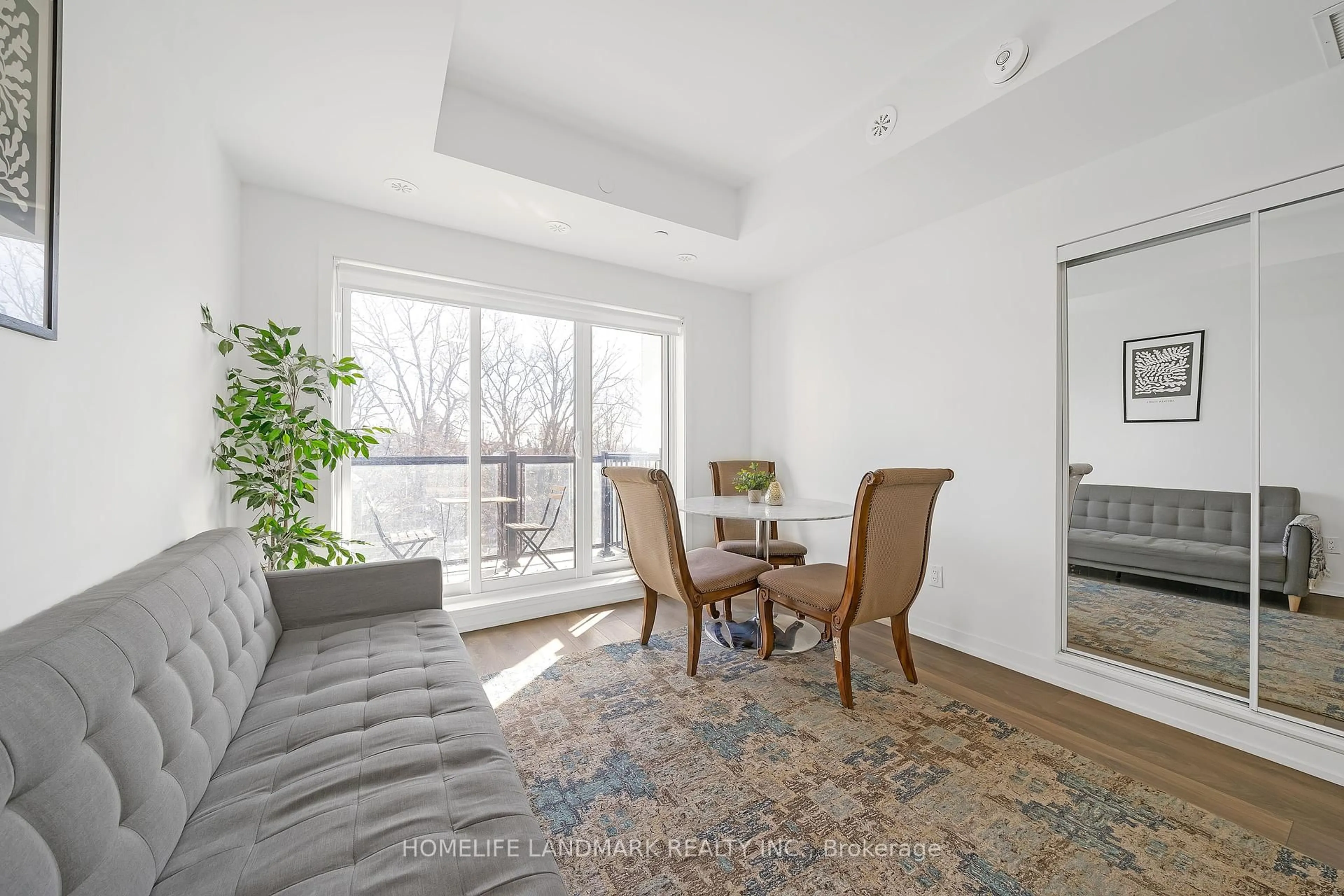 Living room with furniture, unknown for 135 Canon Jackson Dr #303, Toronto Ontario M6M 0C3