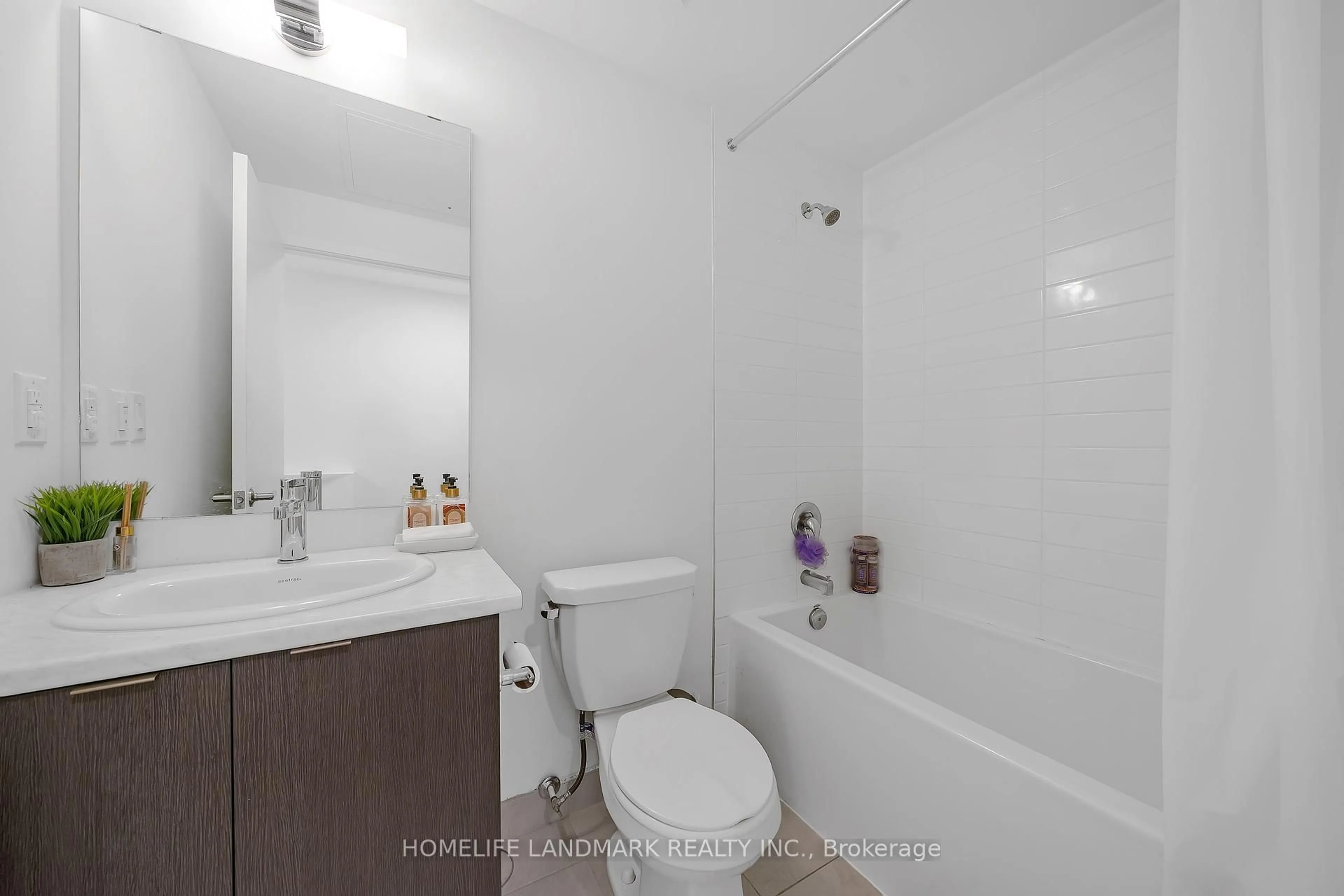 Standard bathroom, floor is not visible for 135 Canon Jackson Dr #303, Toronto Ontario M6M 0C3