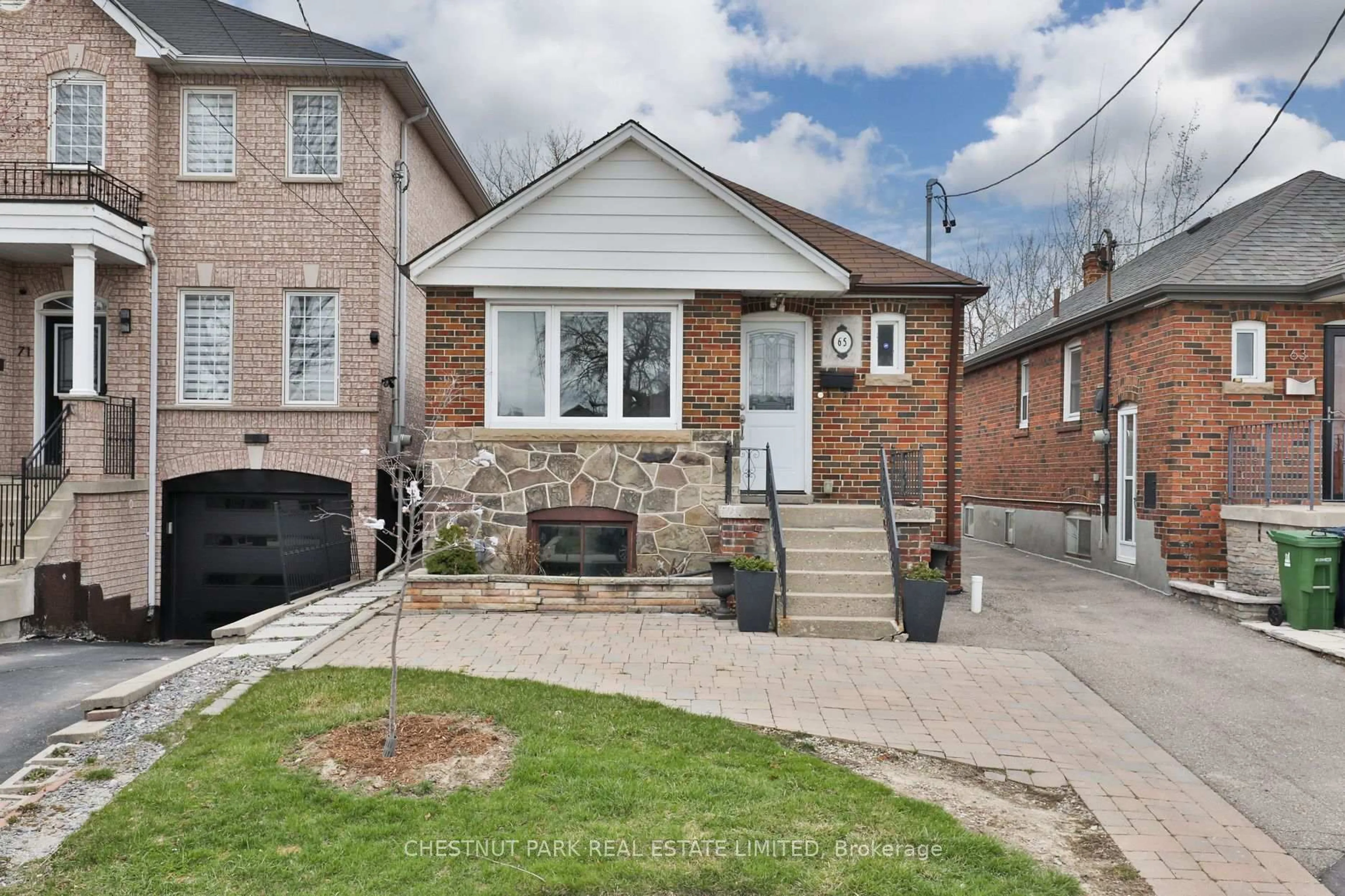 Home with brick exterior material, street for 65 Kane Ave, Toronto Ontario M6M 3M8