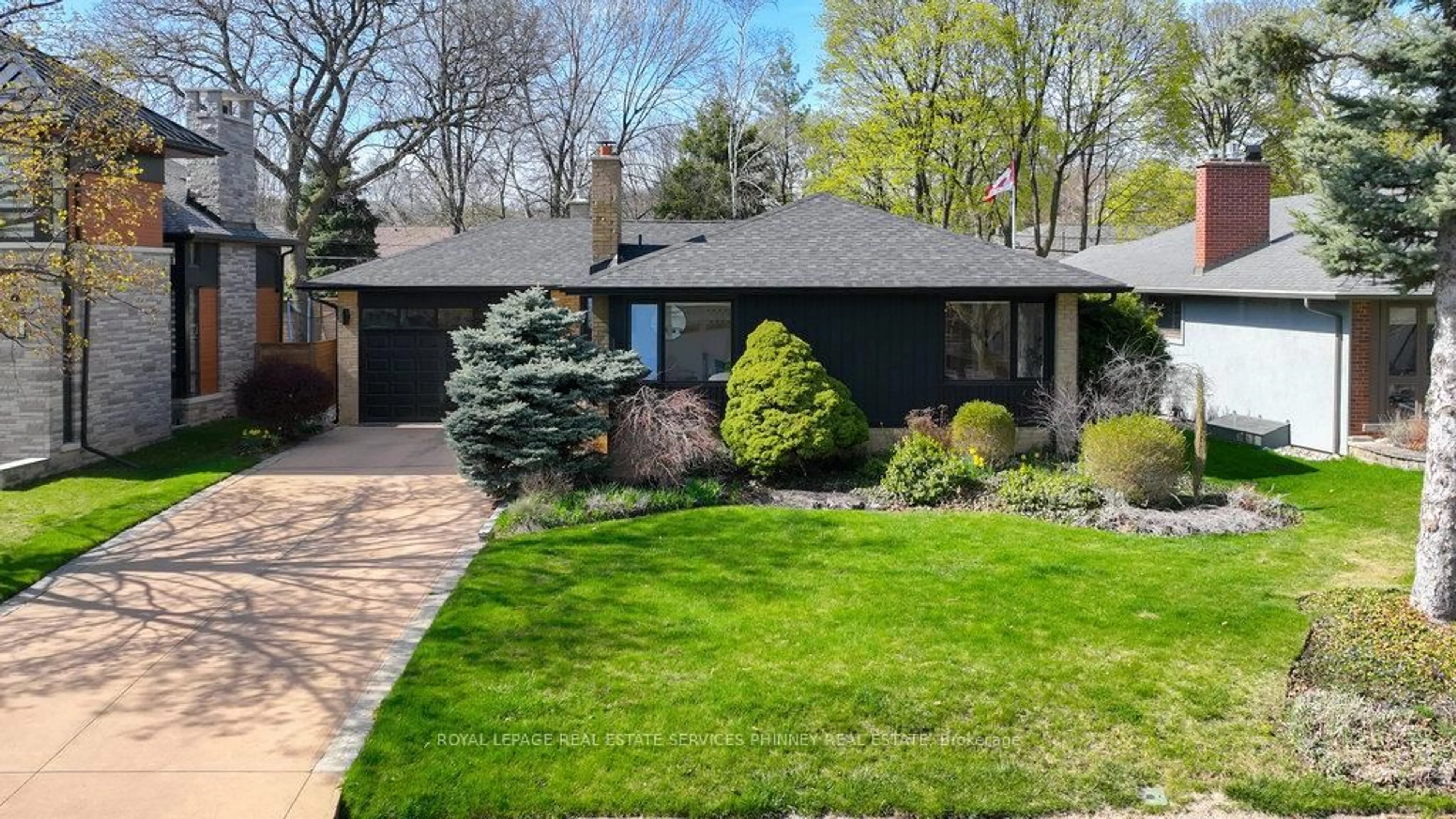 Home with brick exterior material, street for 102 Prince George Dr, Toronto Ontario M9B 2X8