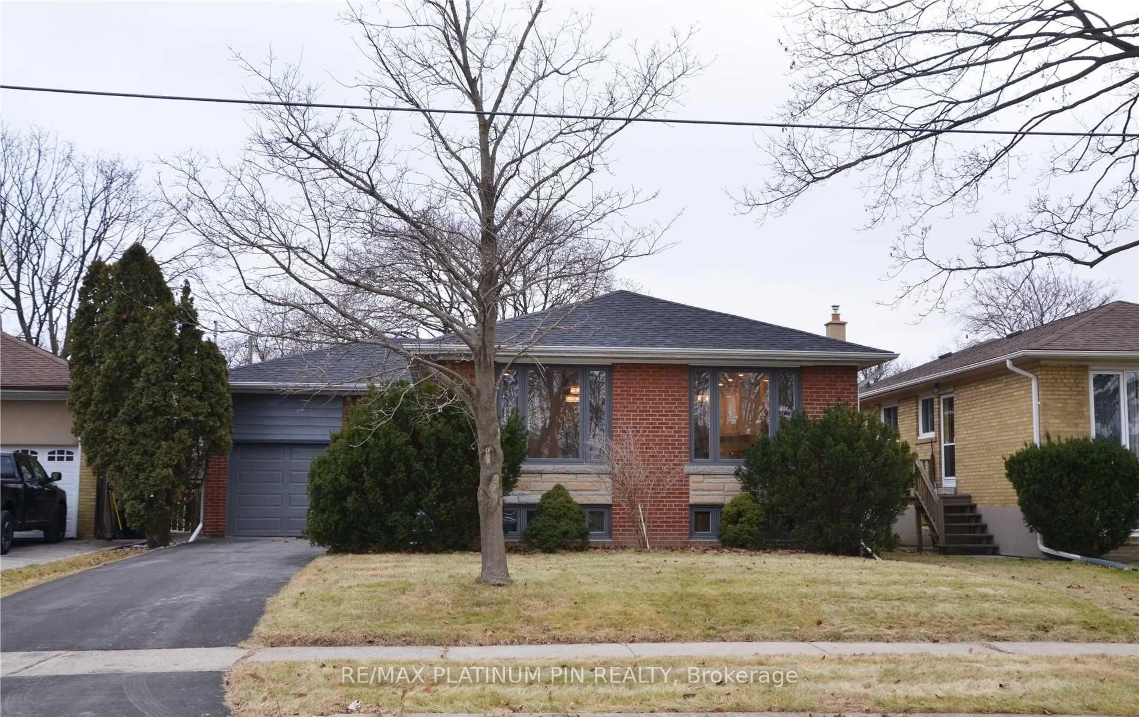 Home with brick exterior material, street for 73 Lavington Dr, Toronto Ontario M9R 2H3