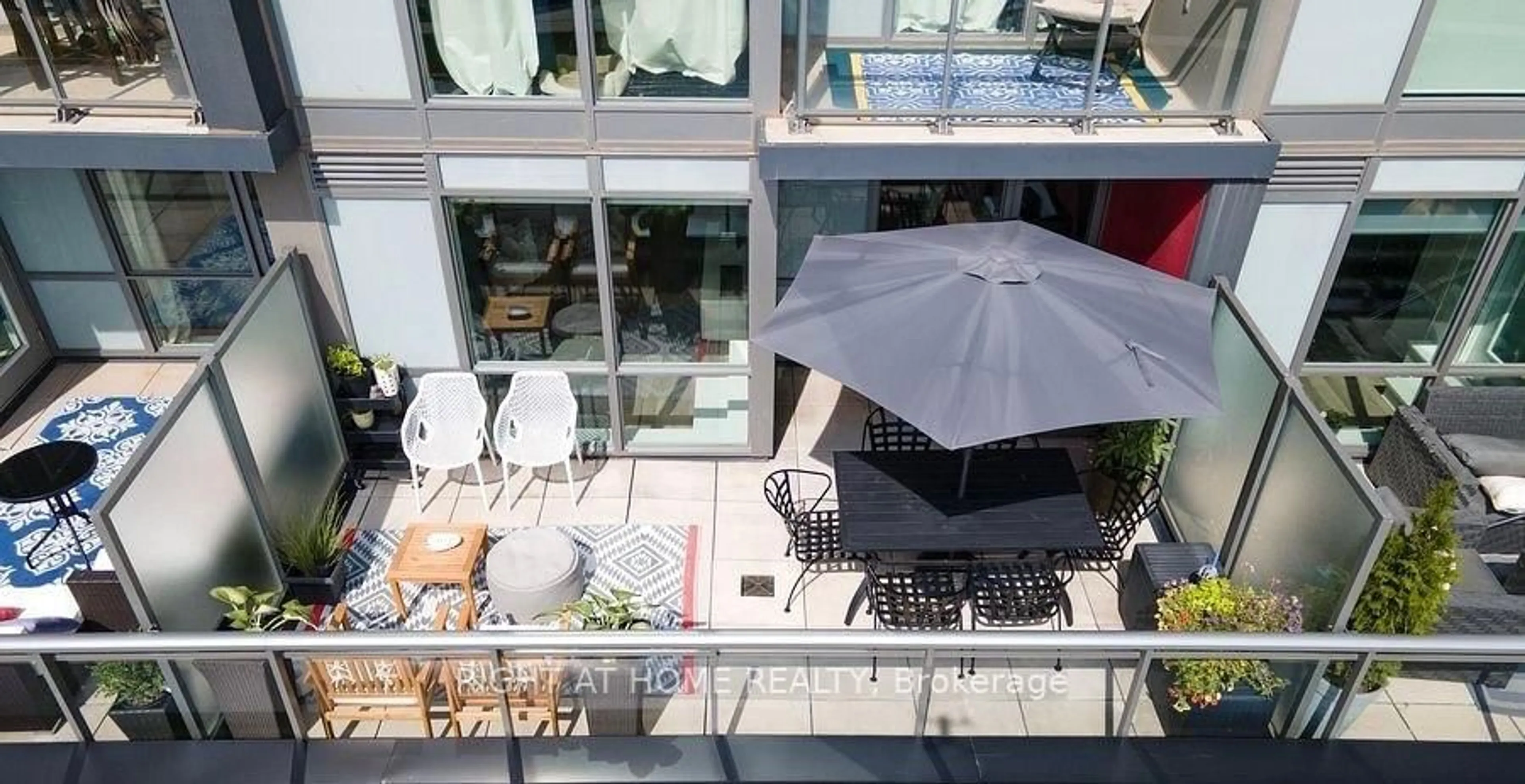Patio, city buildings view from balcony for 5220 Dundas St #D319, Burlington Ontario L7L 0J4