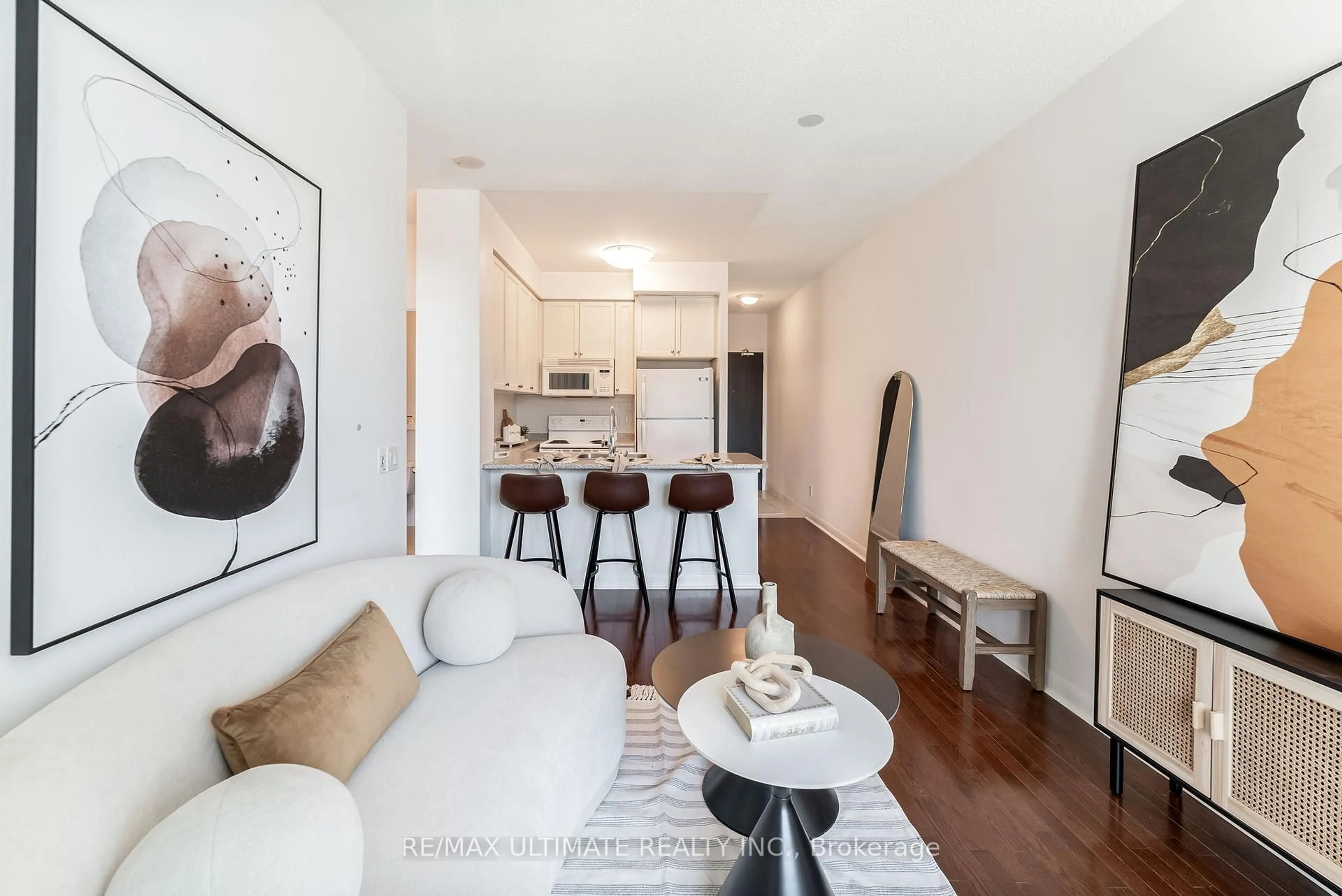 Living room with furniture, wood/laminate floor for 235 Sherway Gardens Rd #205, Toronto Ontario M9C 0A2