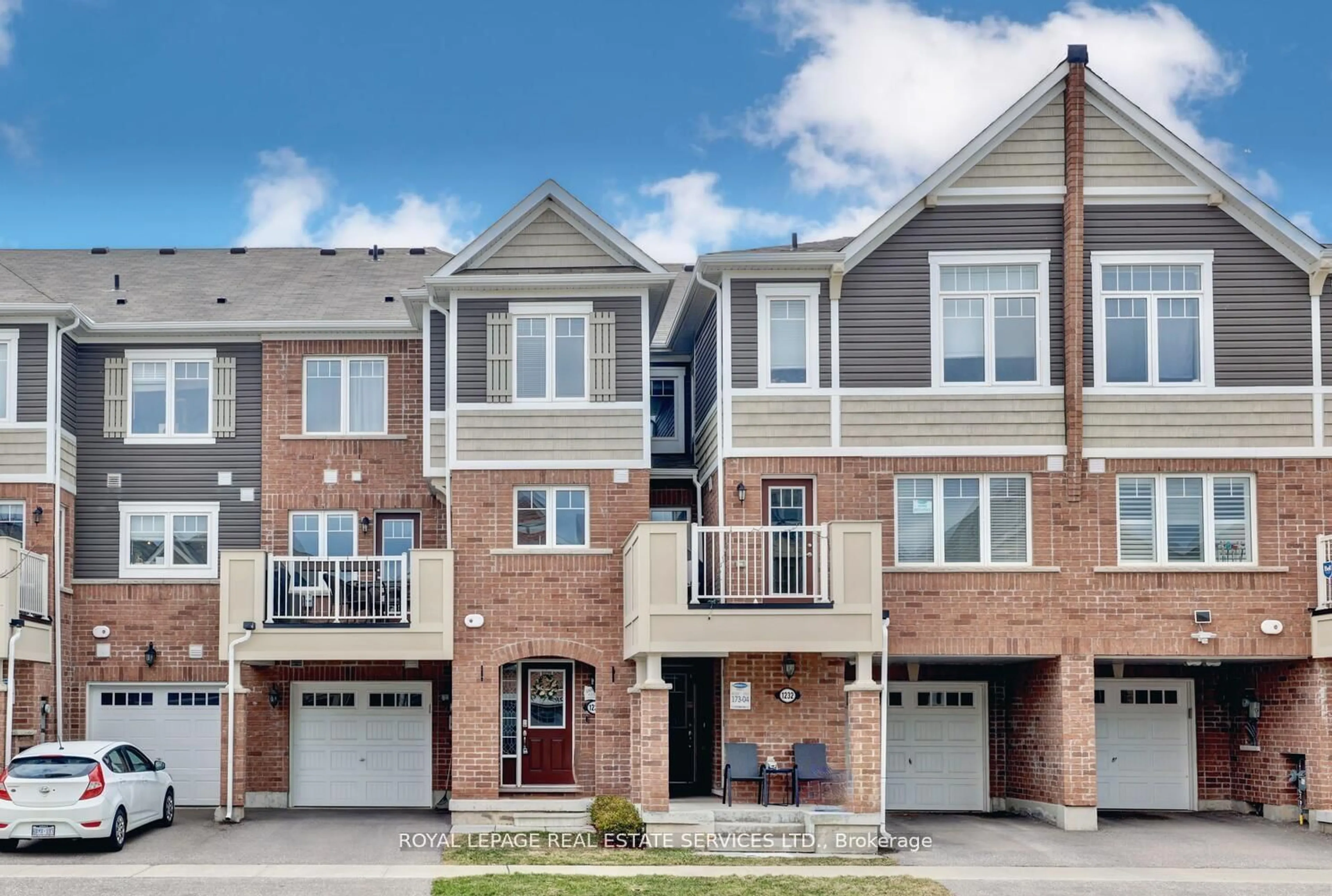 Home with brick exterior material, street for 1234 Rose Way, Milton Ontario L9E 1L9