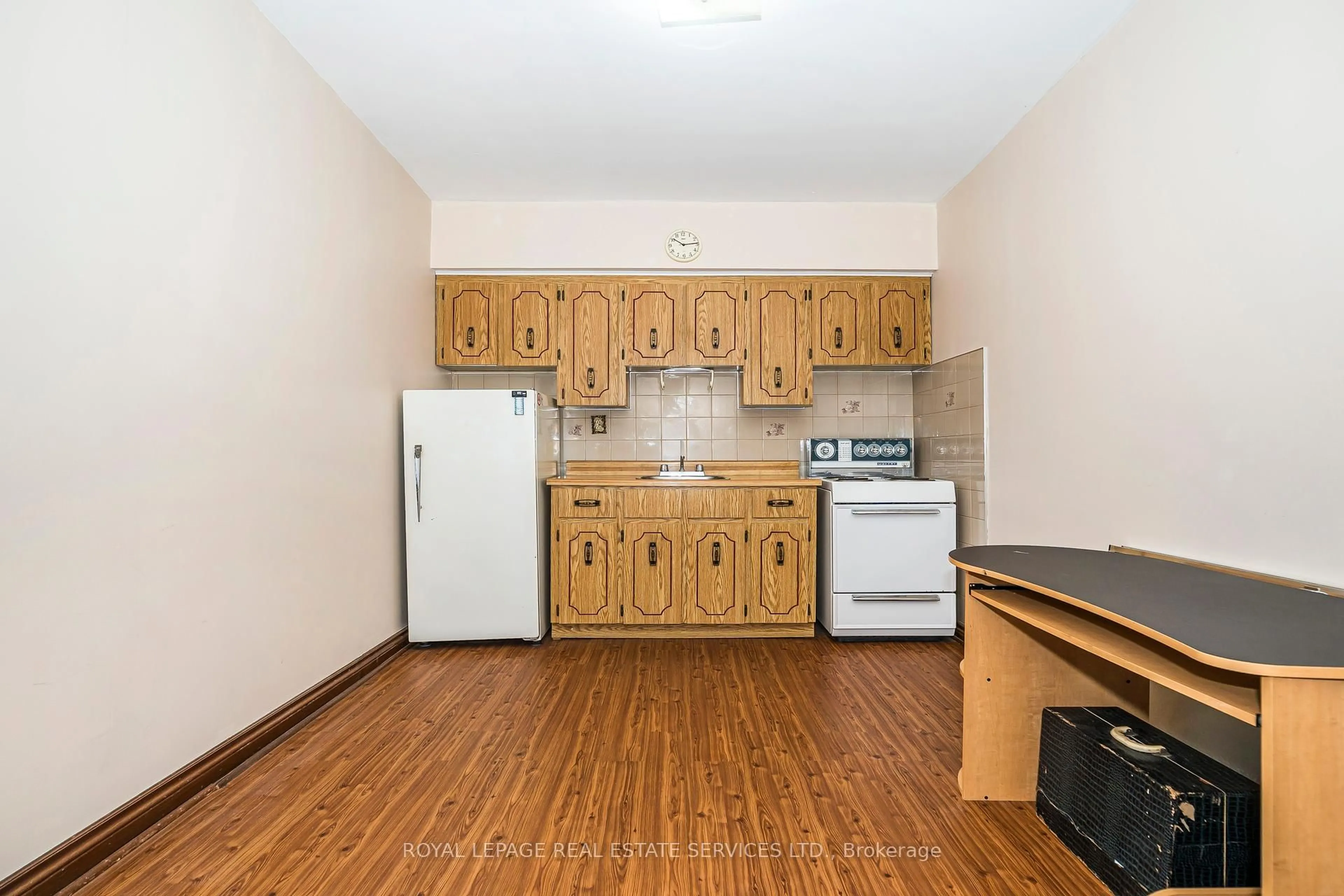 Standard kitchen, wood/laminate floor for 56 Lynd Ave, Toronto Ontario M6R 1T9