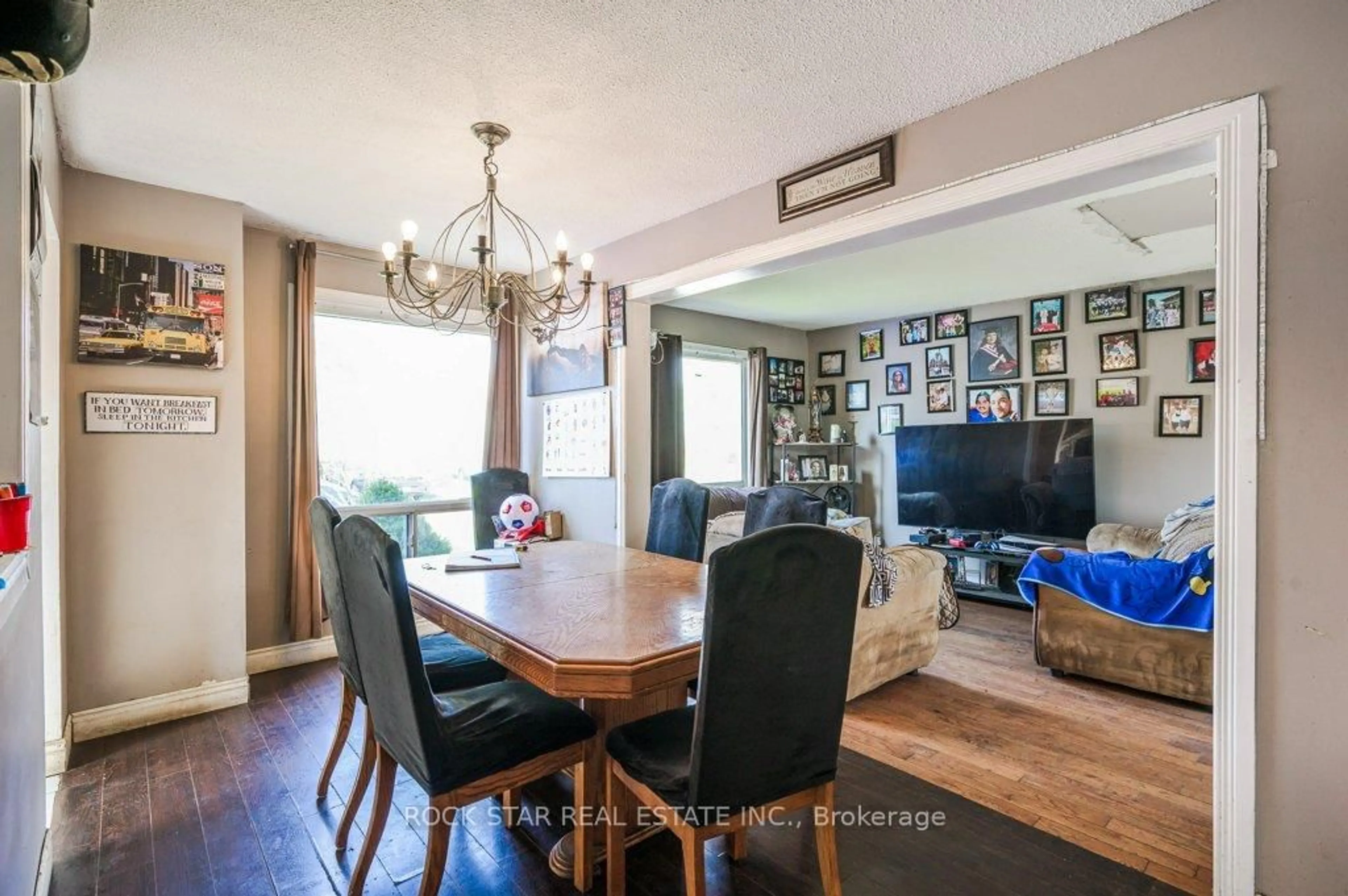 Dining room, wood/laminate floor for 25 Hannibal Sq, Brampton Ontario L6S 1Y5