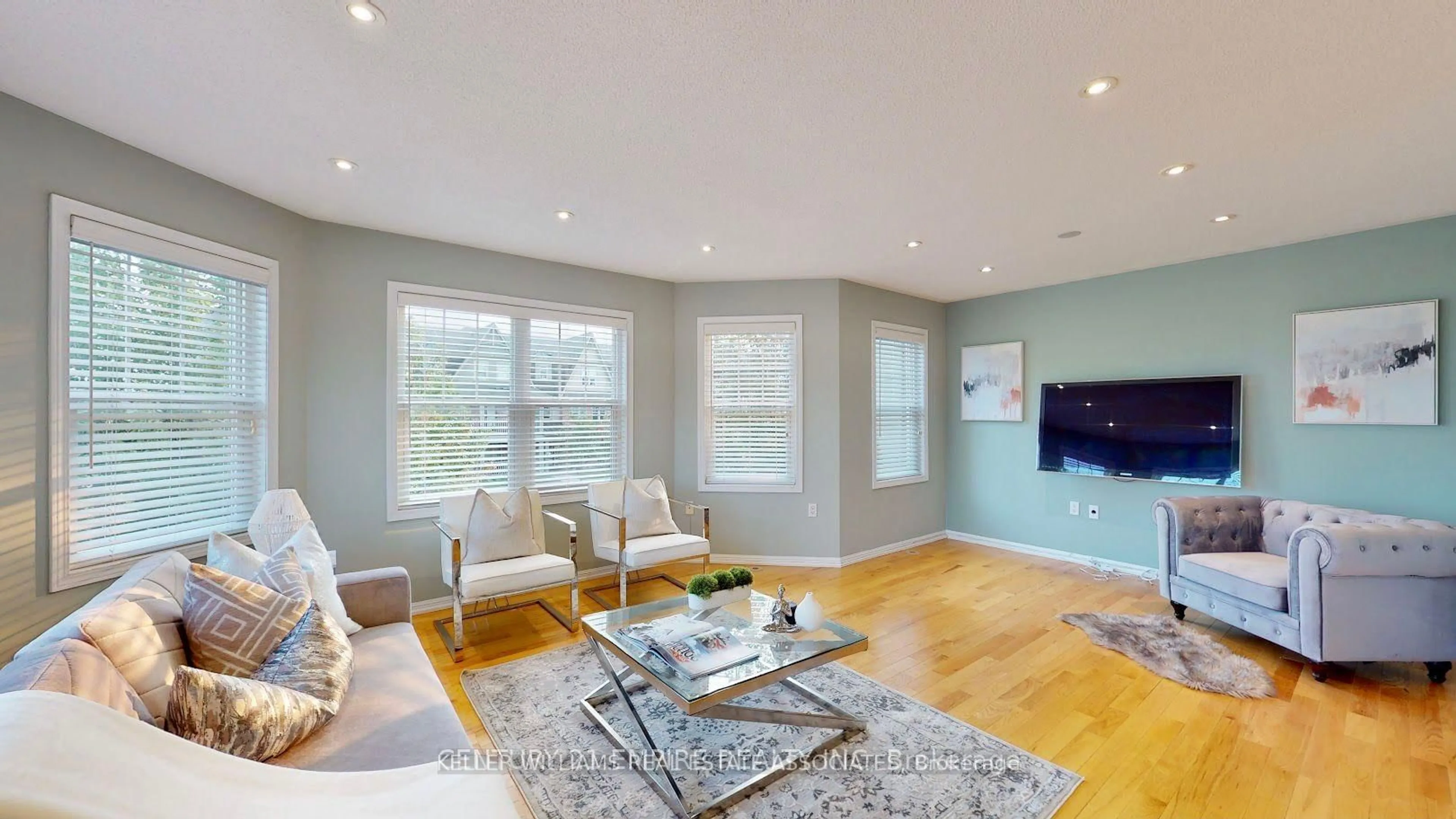 Living room with furniture, wood/laminate floor for 679 Holly Ave, Milton Ontario L9T 0G2