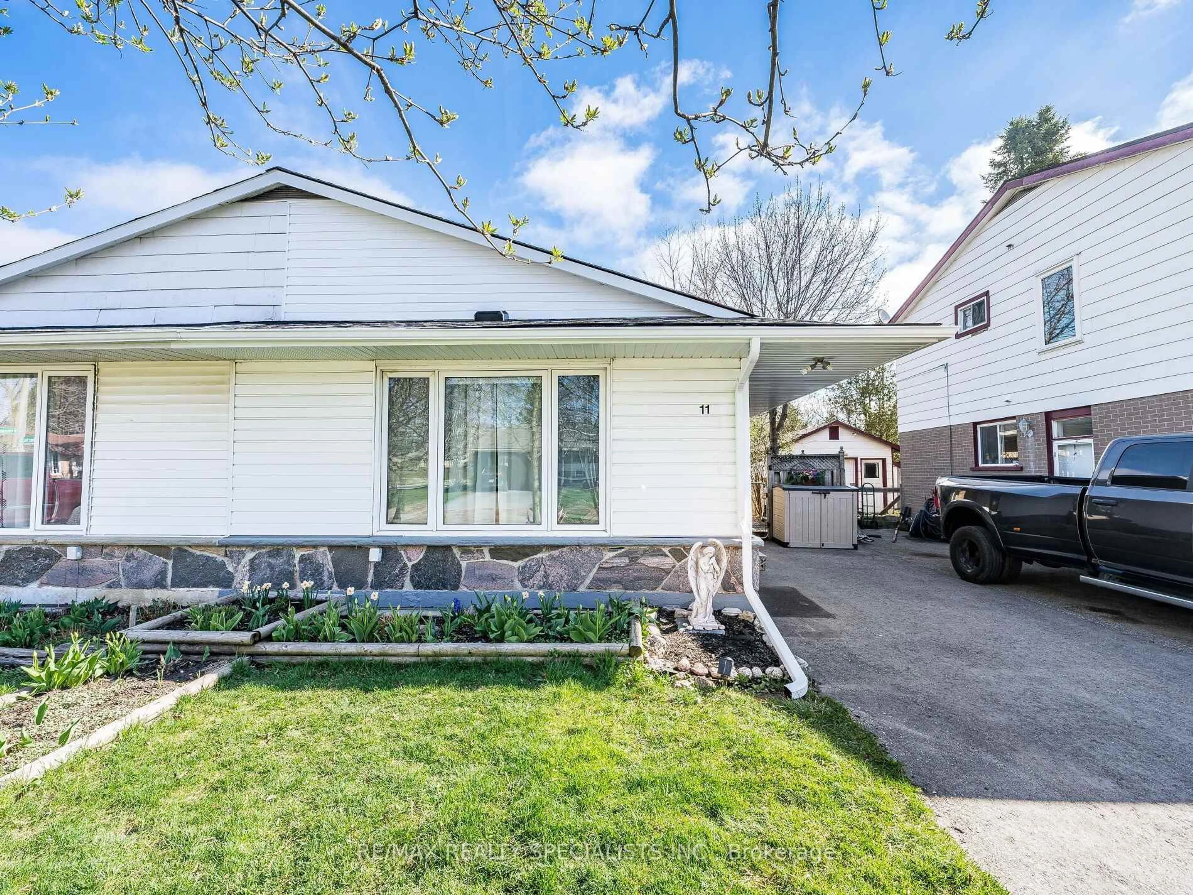 Home with vinyl exterior material, street for 11 Ontario St, Orangeville Ontario L9W 2T9