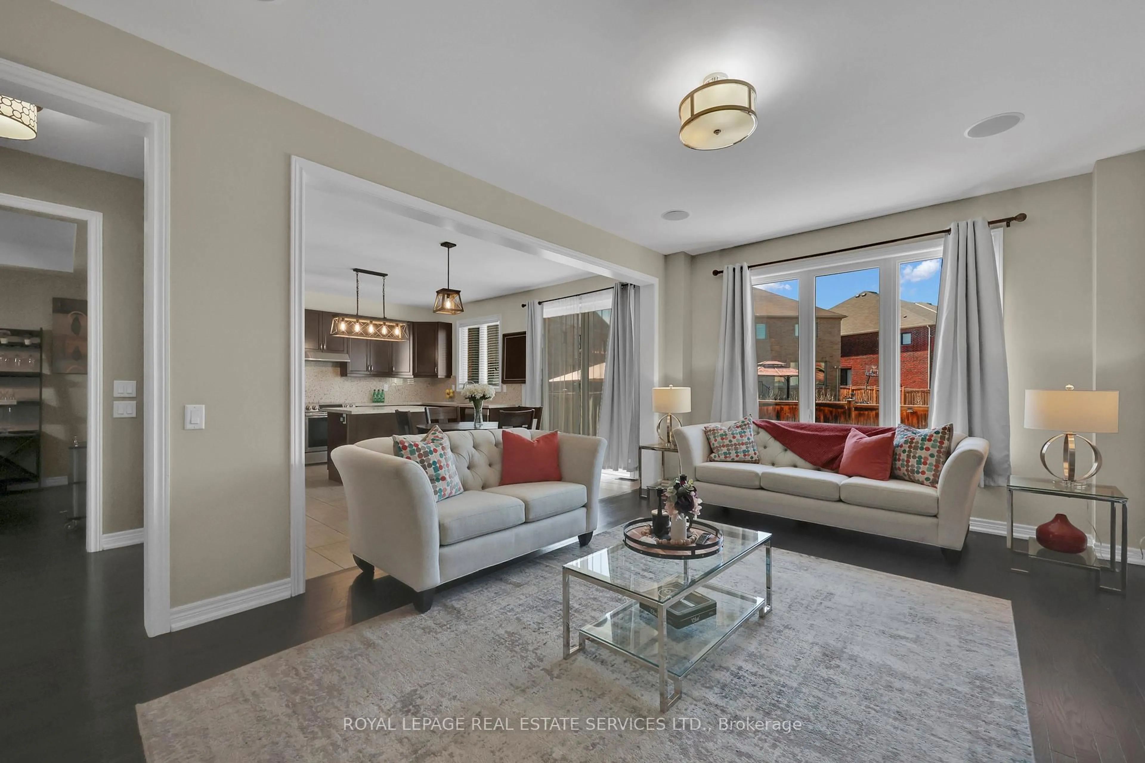 Living room with furniture, ceramic/tile floor for 60 Valleyway Dr, Brampton Ontario L6X 5G1