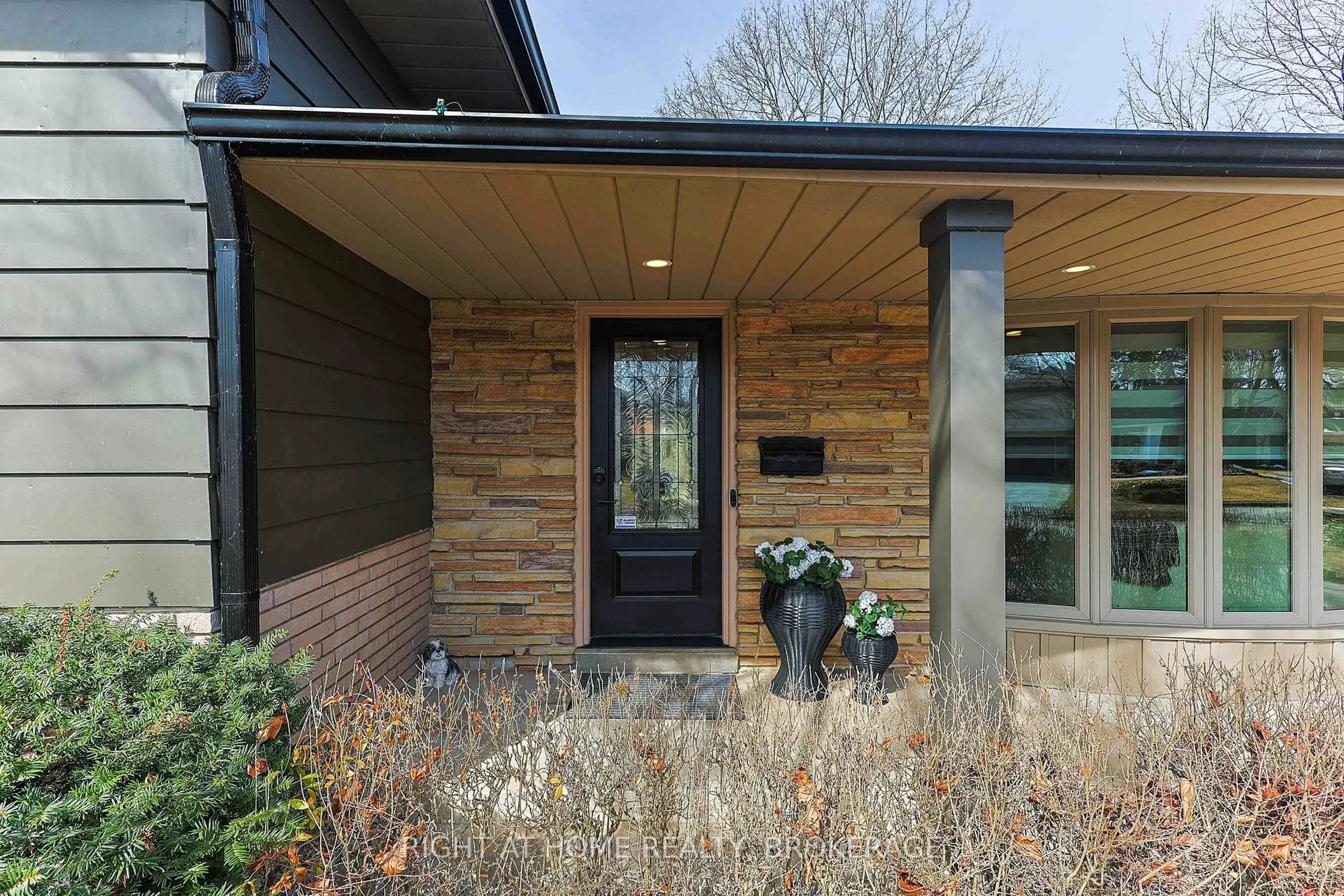 Home with brick exterior material, street for 4453 Concord Pl, Burlington Ontario L7L 1J5