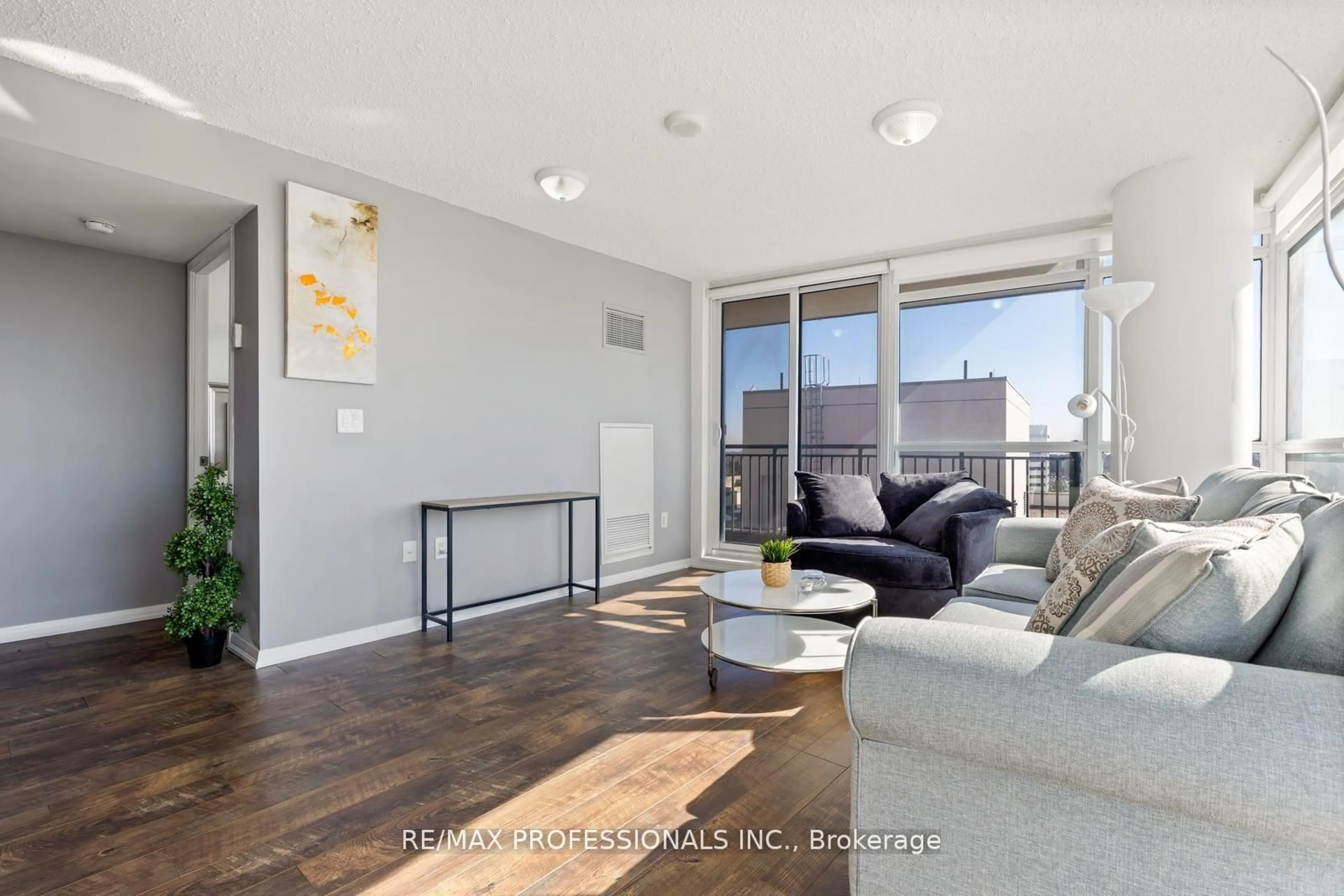 Living room with furniture, wood/laminate floor for 800 Lawrence Ave #1014, Toronto Ontario M6A 0B1