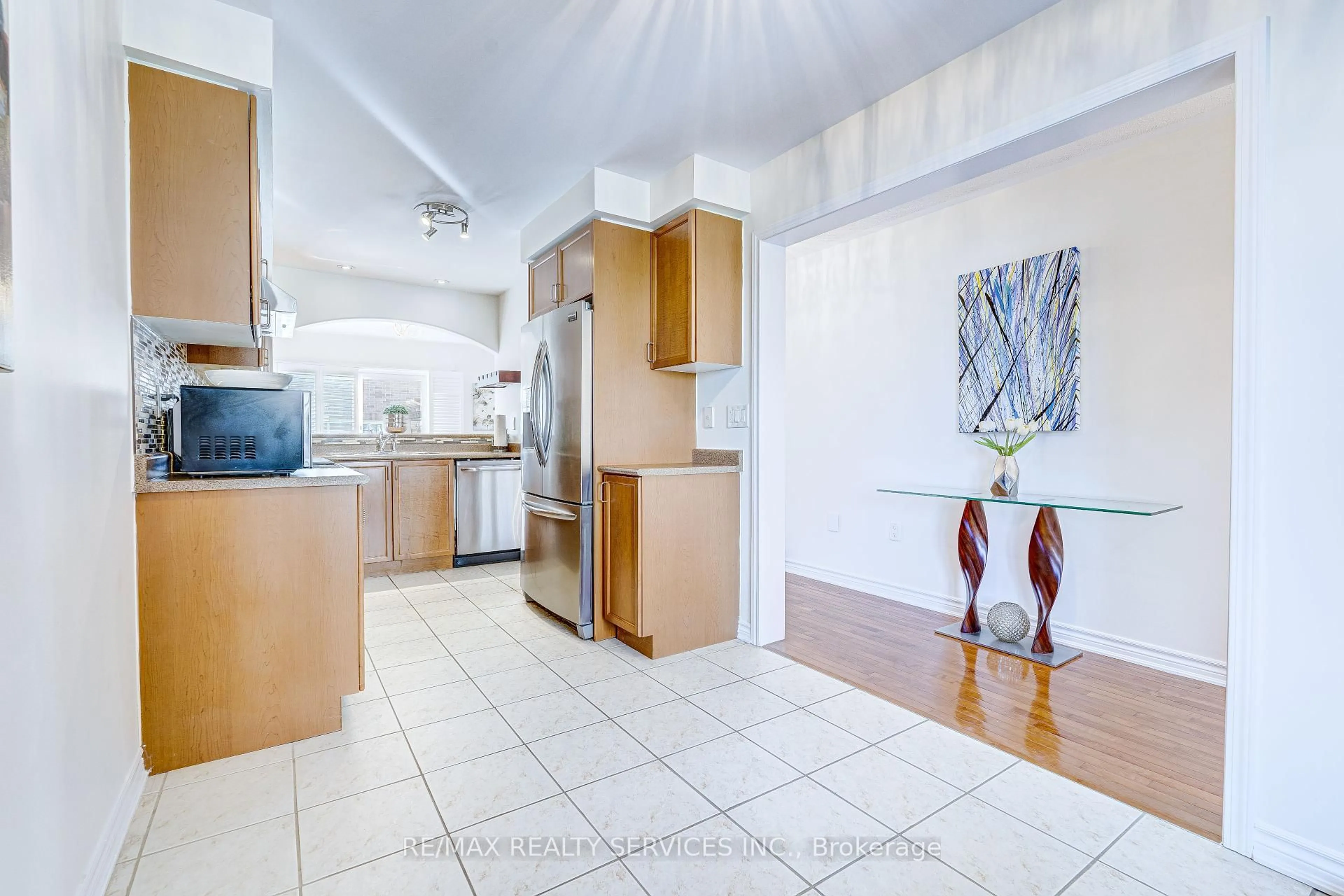 Open concept kitchen, ceramic/tile floor for 944 Hasselfeldt Hts, Milton Ontario L9T 0M5