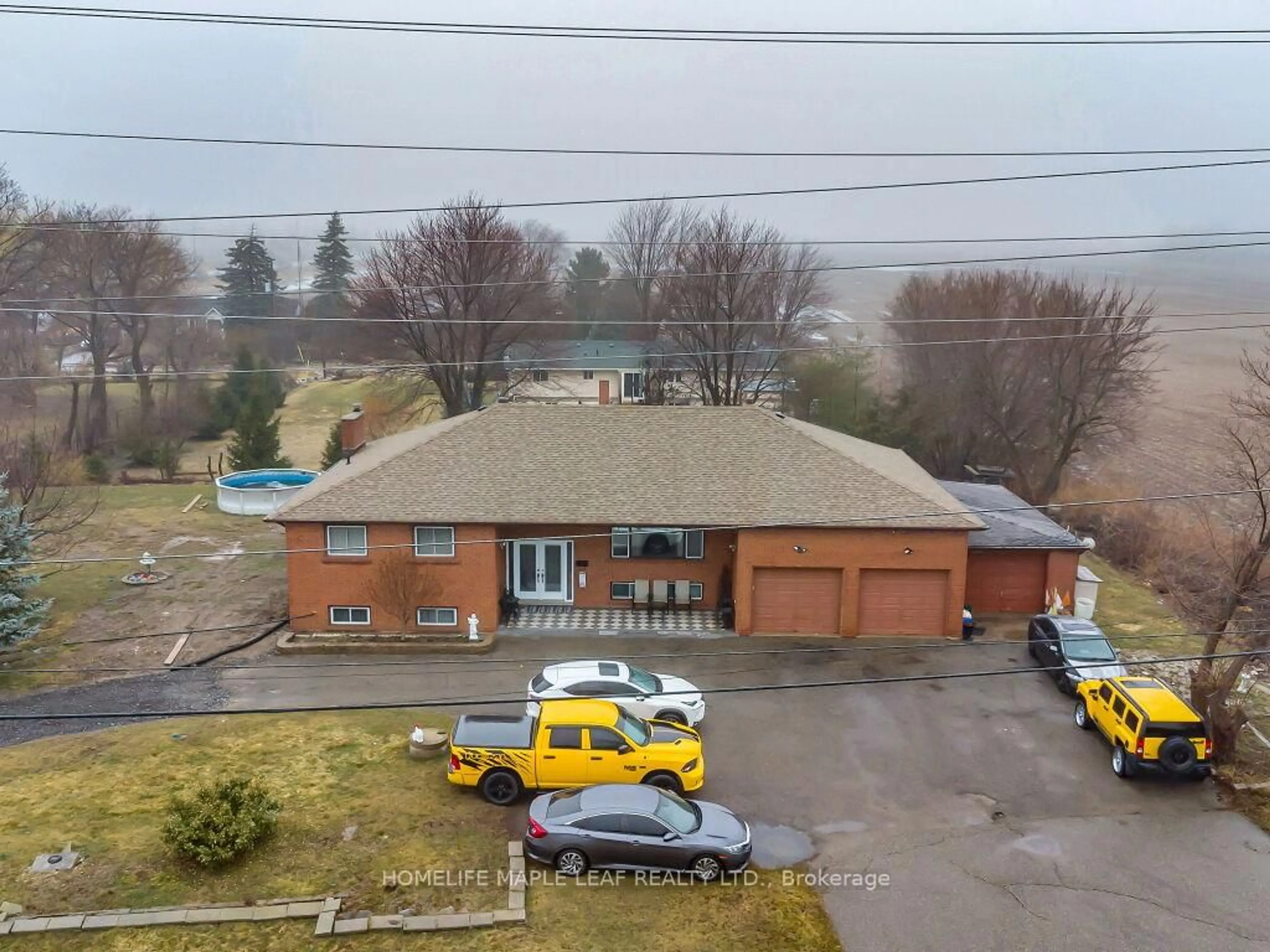 A pic from outside/outdoor area/front of a property/back of a property/a pic from drone, unknown for 13089 10th side Rd, Halton Hills Ontario L7G 4S5