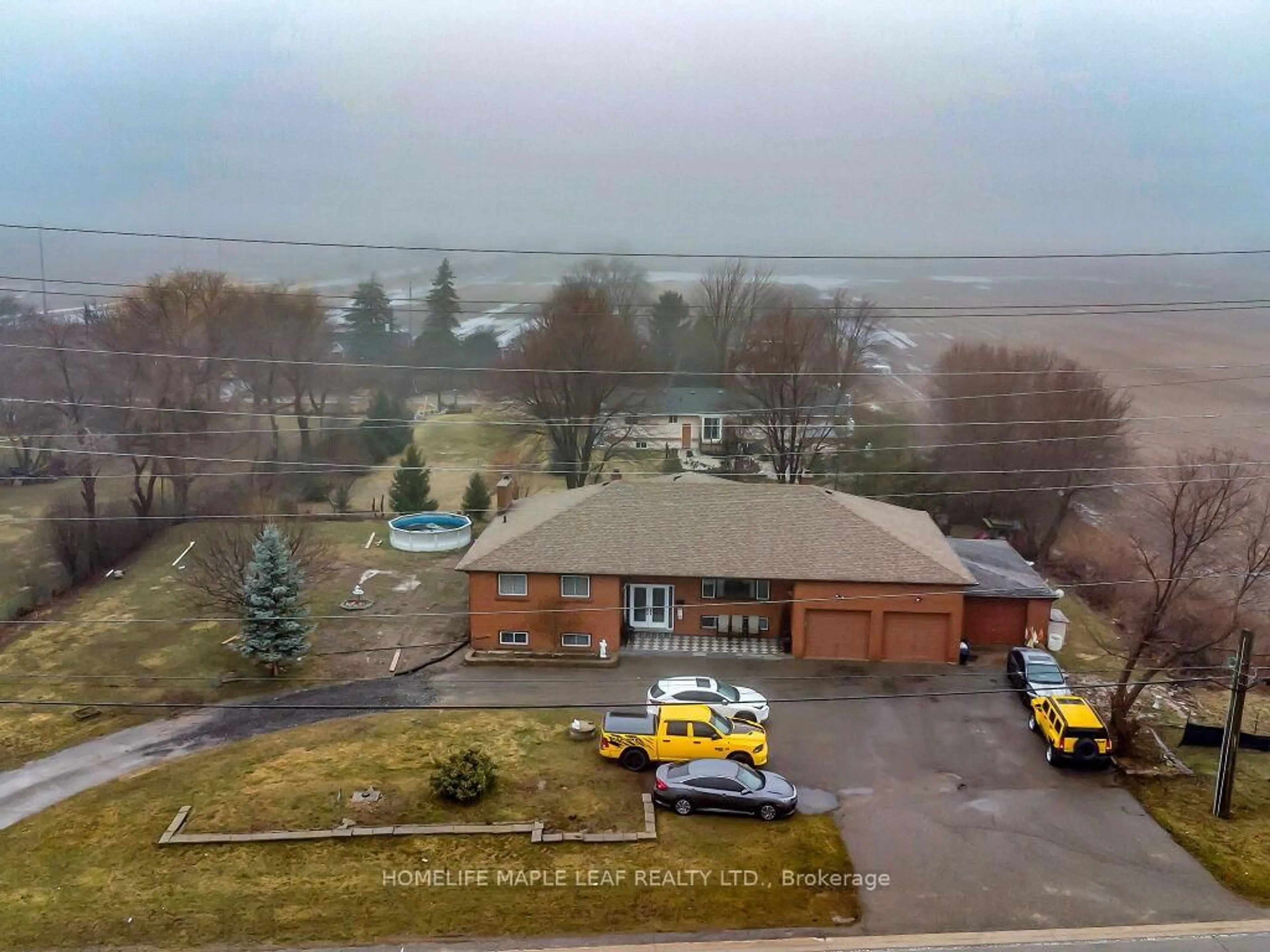 A pic from outside/outdoor area/front of a property/back of a property/a pic from drone, unknown for 13089 10th side Rd, Halton Hills Ontario L7G 4S5