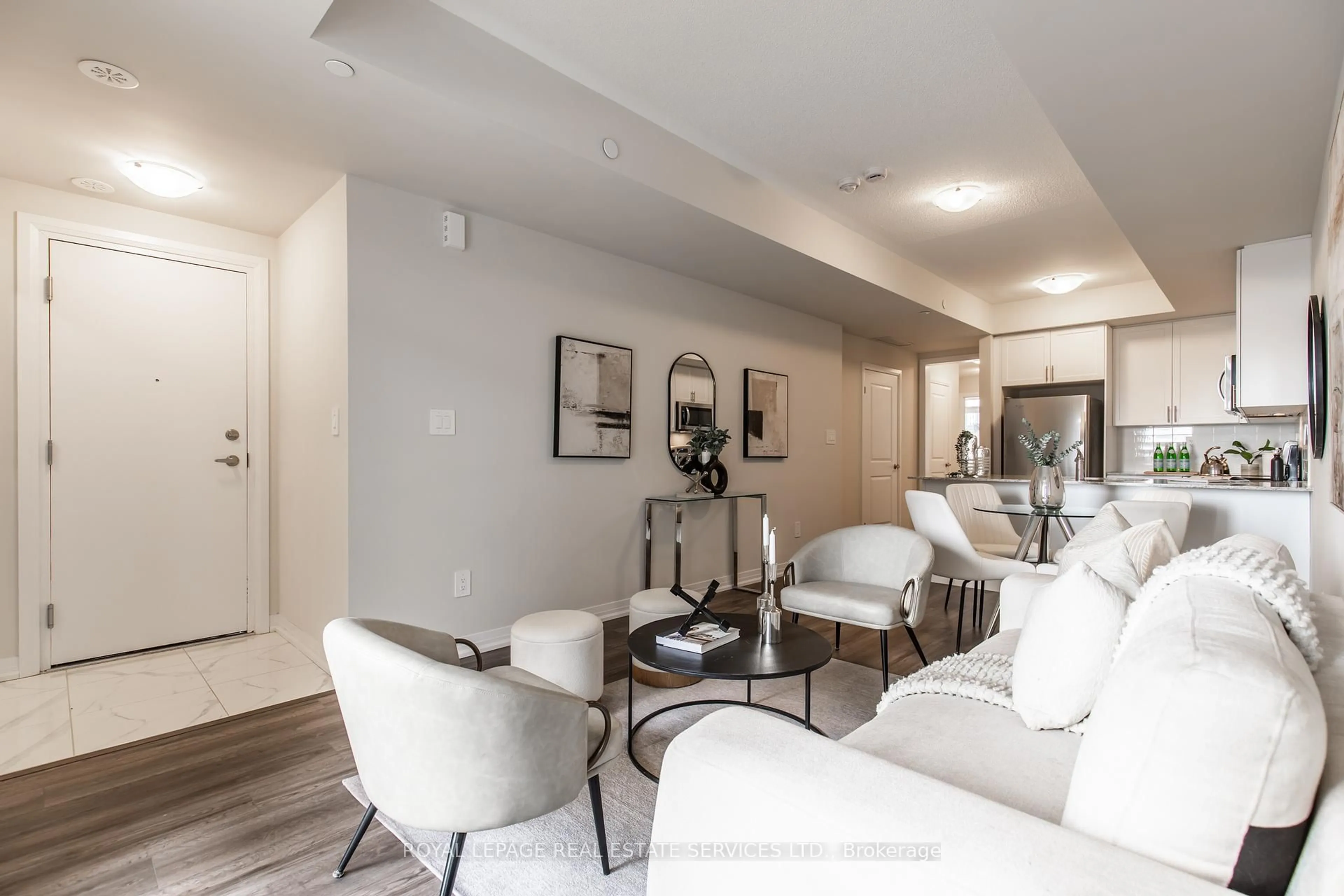 Living room with furniture, unknown for 1597 Rose Way #112, Milton Ontario L9E 1N4