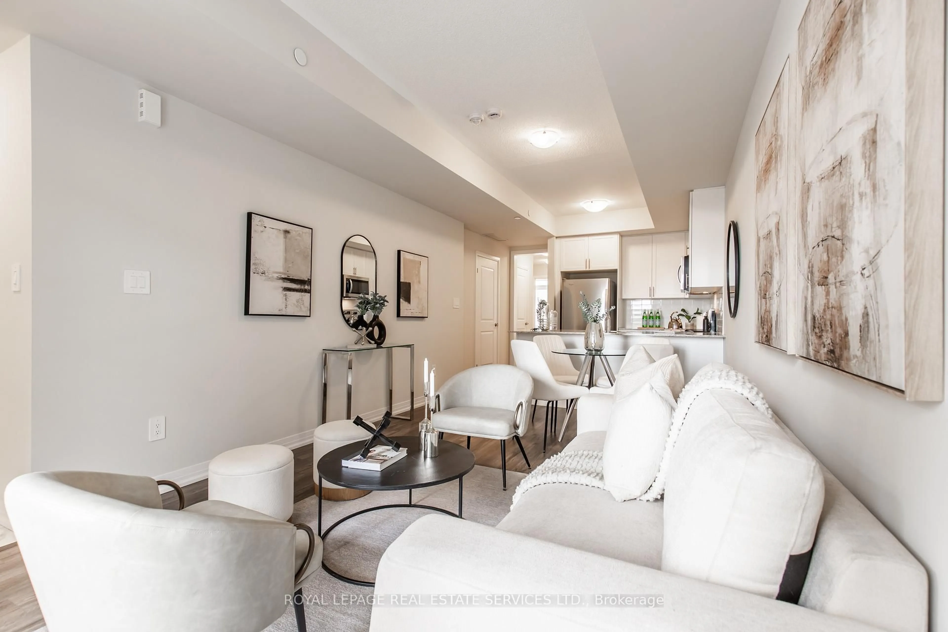 Living room with furniture, unknown for 1597 Rose Way #112, Milton Ontario L9E 1N4
