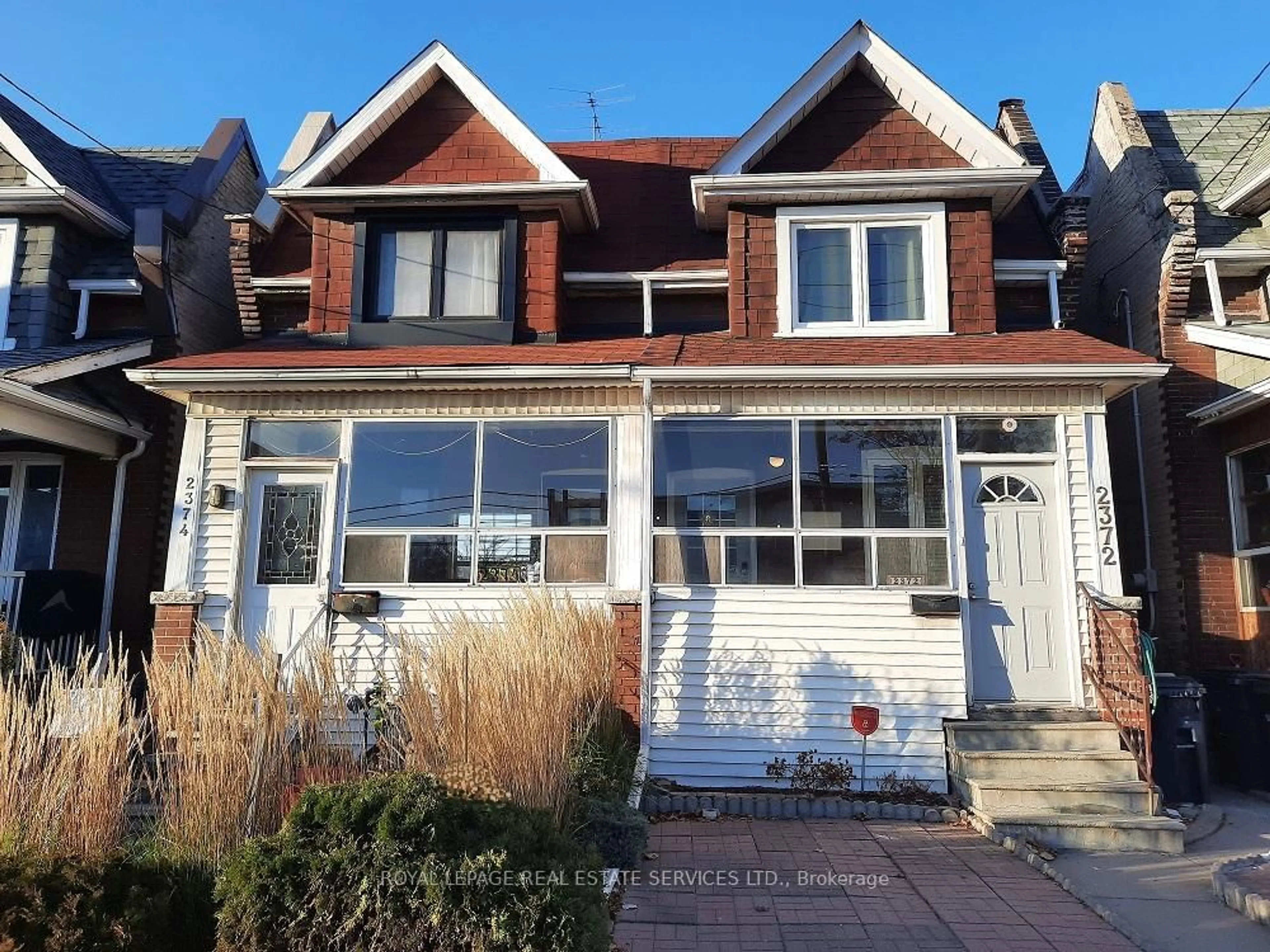 Home with brick exterior material, street for 2372 St Clair Ave, Toronto Ontario M6N 1K8