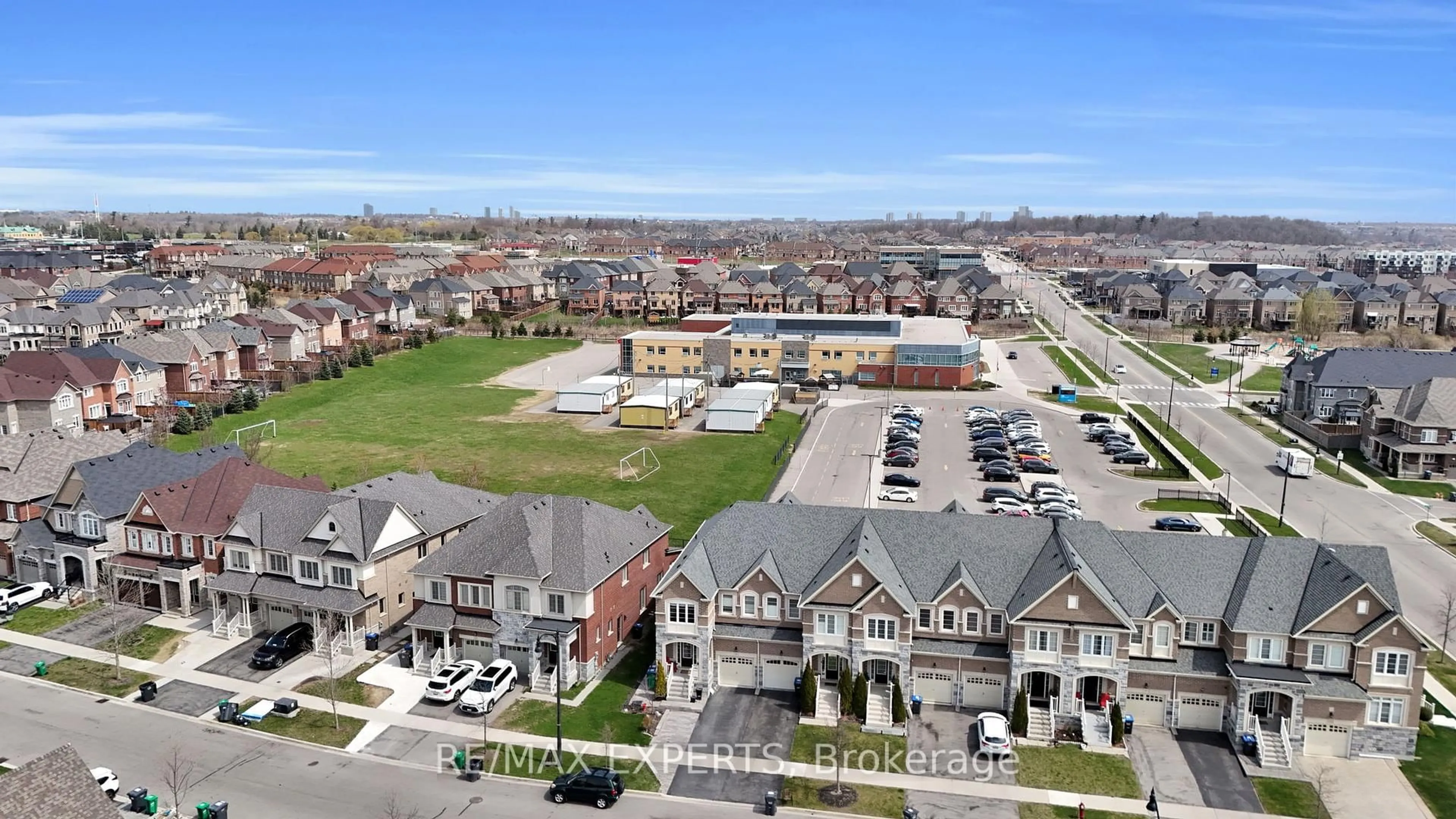A pic from outside/outdoor area/front of a property/back of a property/a pic from drone, unknown for 108 Little Britain Cres, Brampton Ontario L6Y 6A9