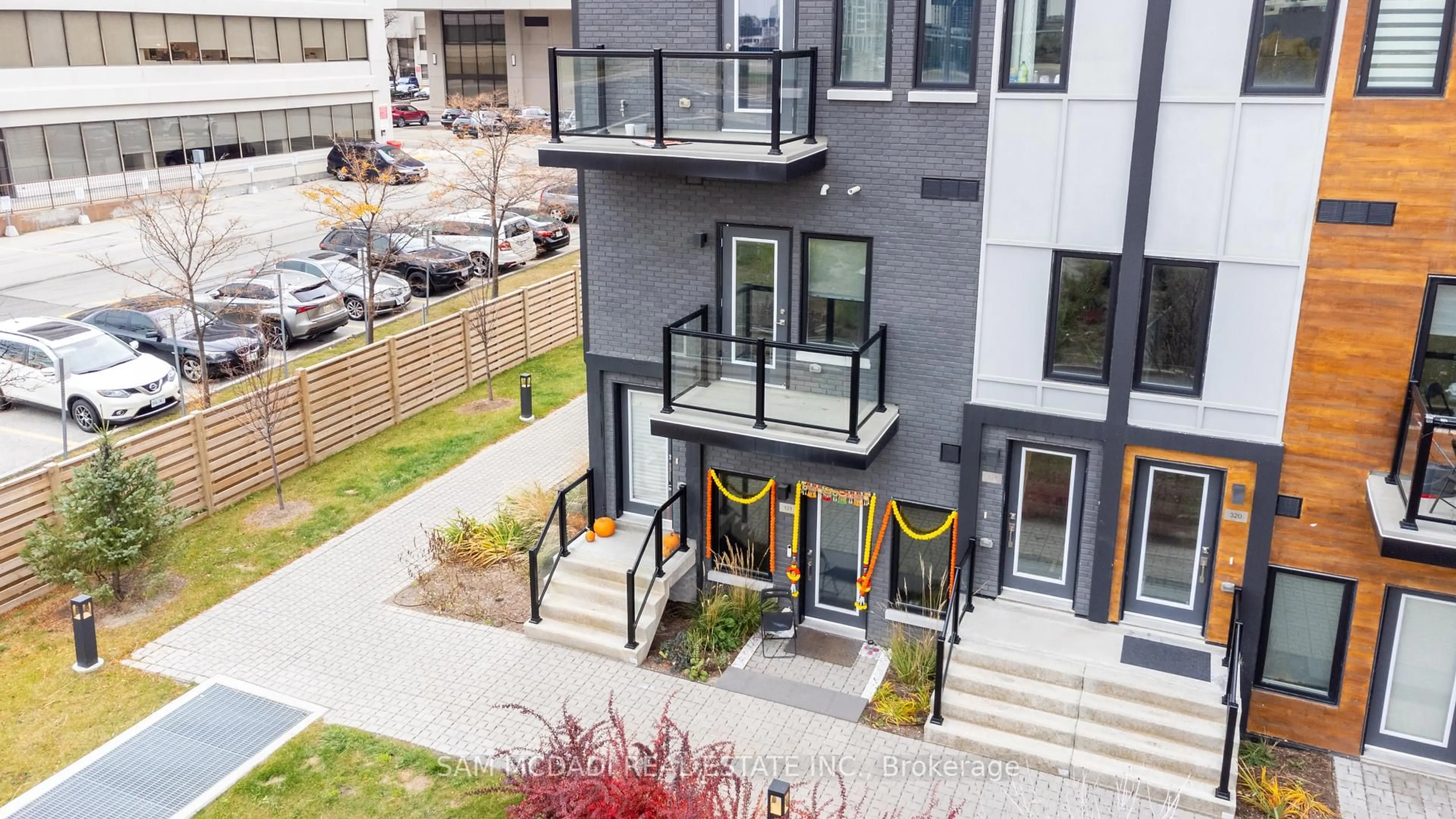 A pic from outside/outdoor area/front of a property/back of a property/a pic from drone, street for 402 The East Mall N/A #220, Toronto Ontario M9B 3Z9
