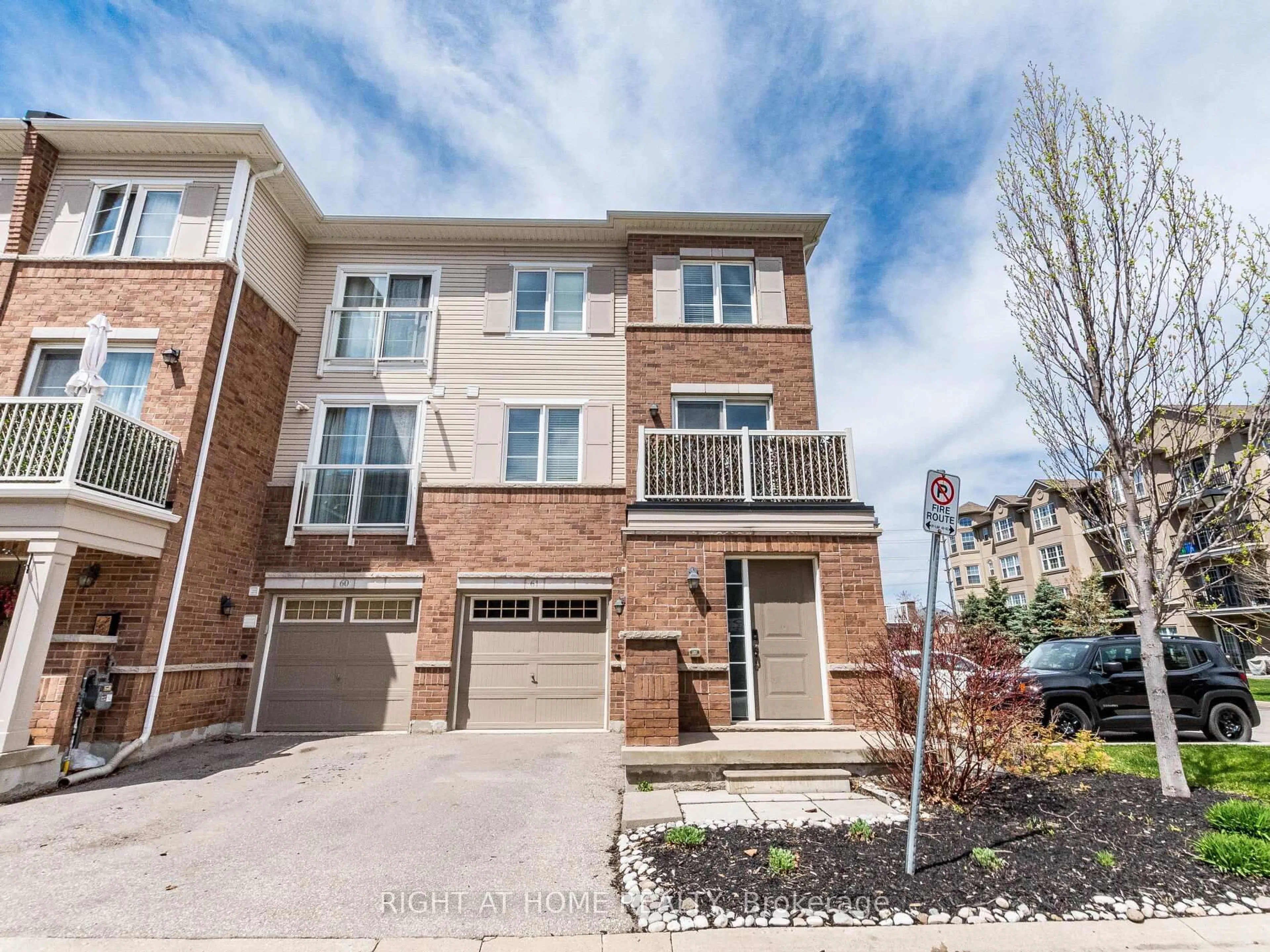 Home with brick exterior material, street for 165 Hampshire Way #61, Milton Ontario L9T 8M7