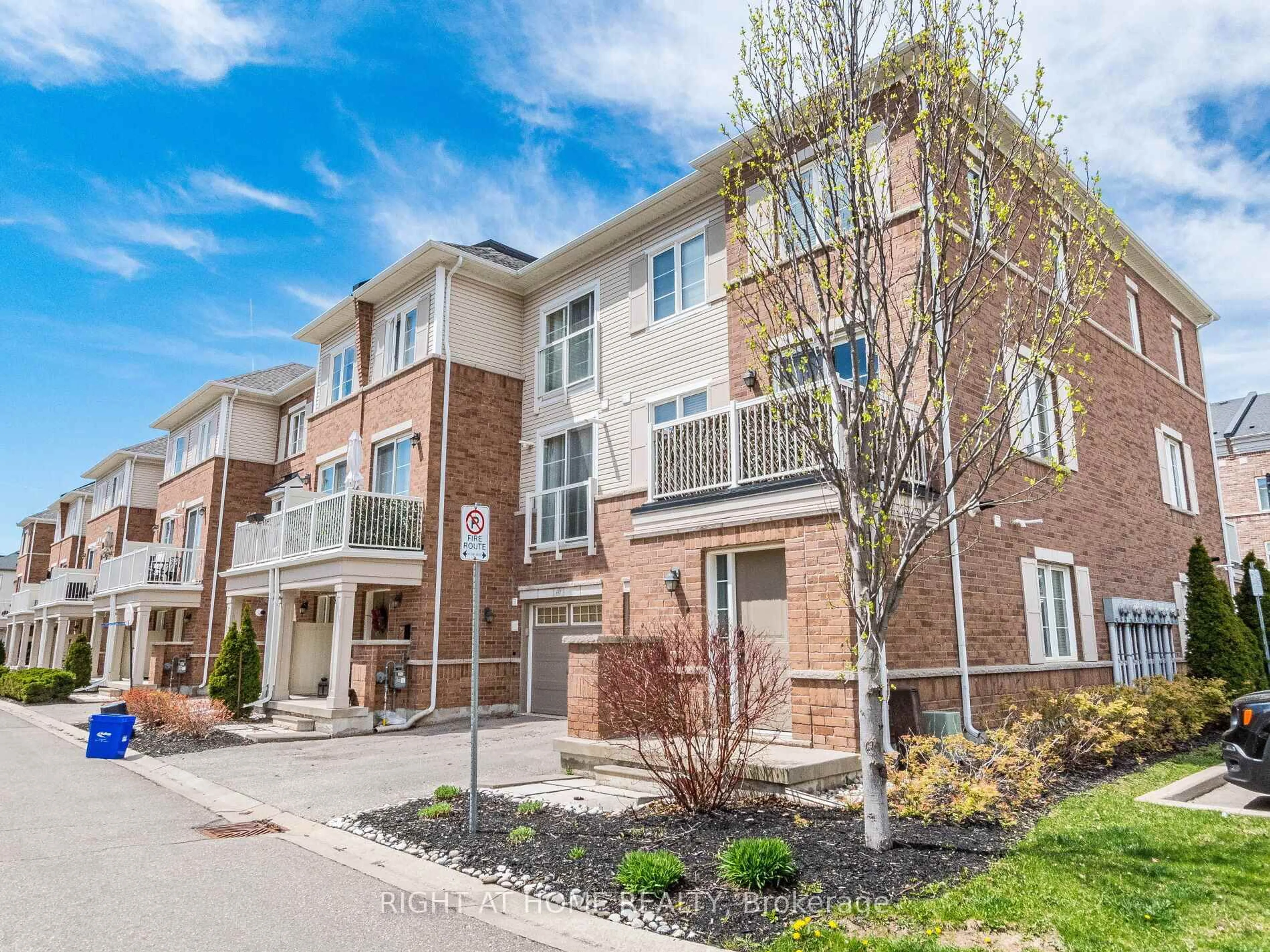 Home with brick exterior material, street for 165 Hampshire Way #61, Milton Ontario L9T 8M7