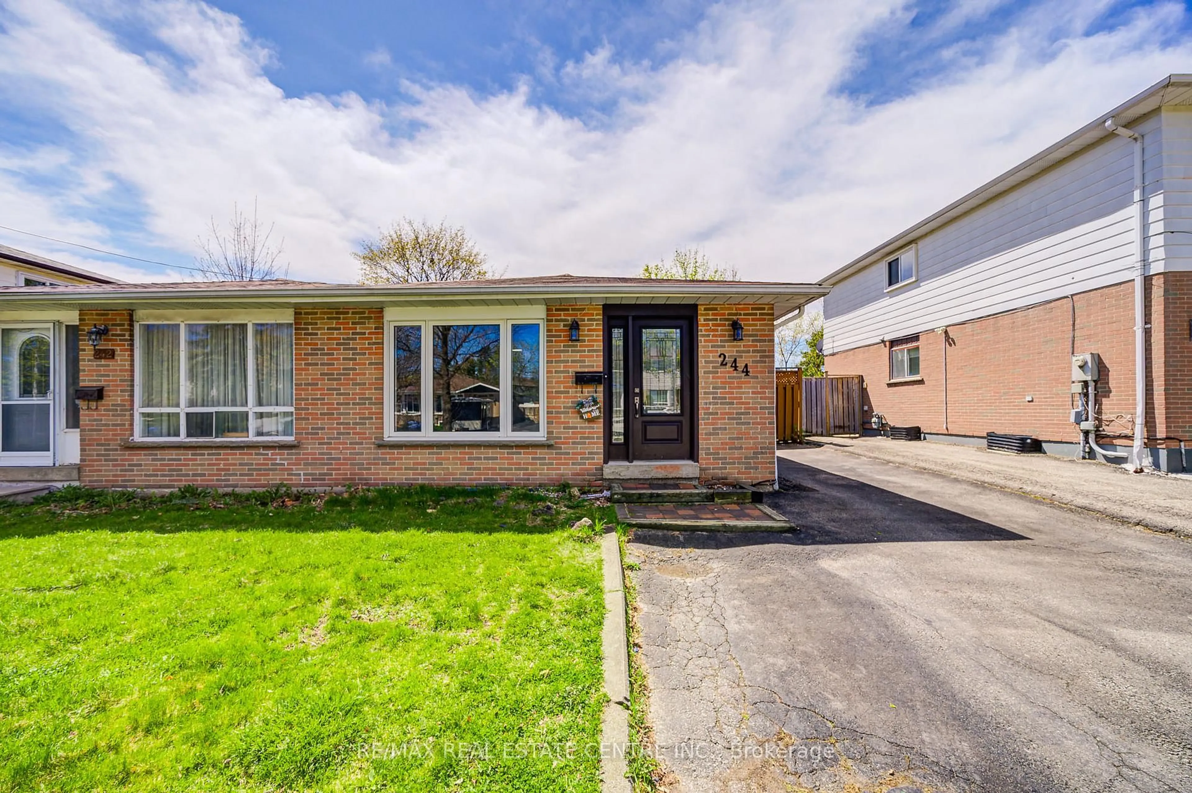 Home with brick exterior material, street for 244 Archdekin Dr, Brampton Ontario L6V 1Z2