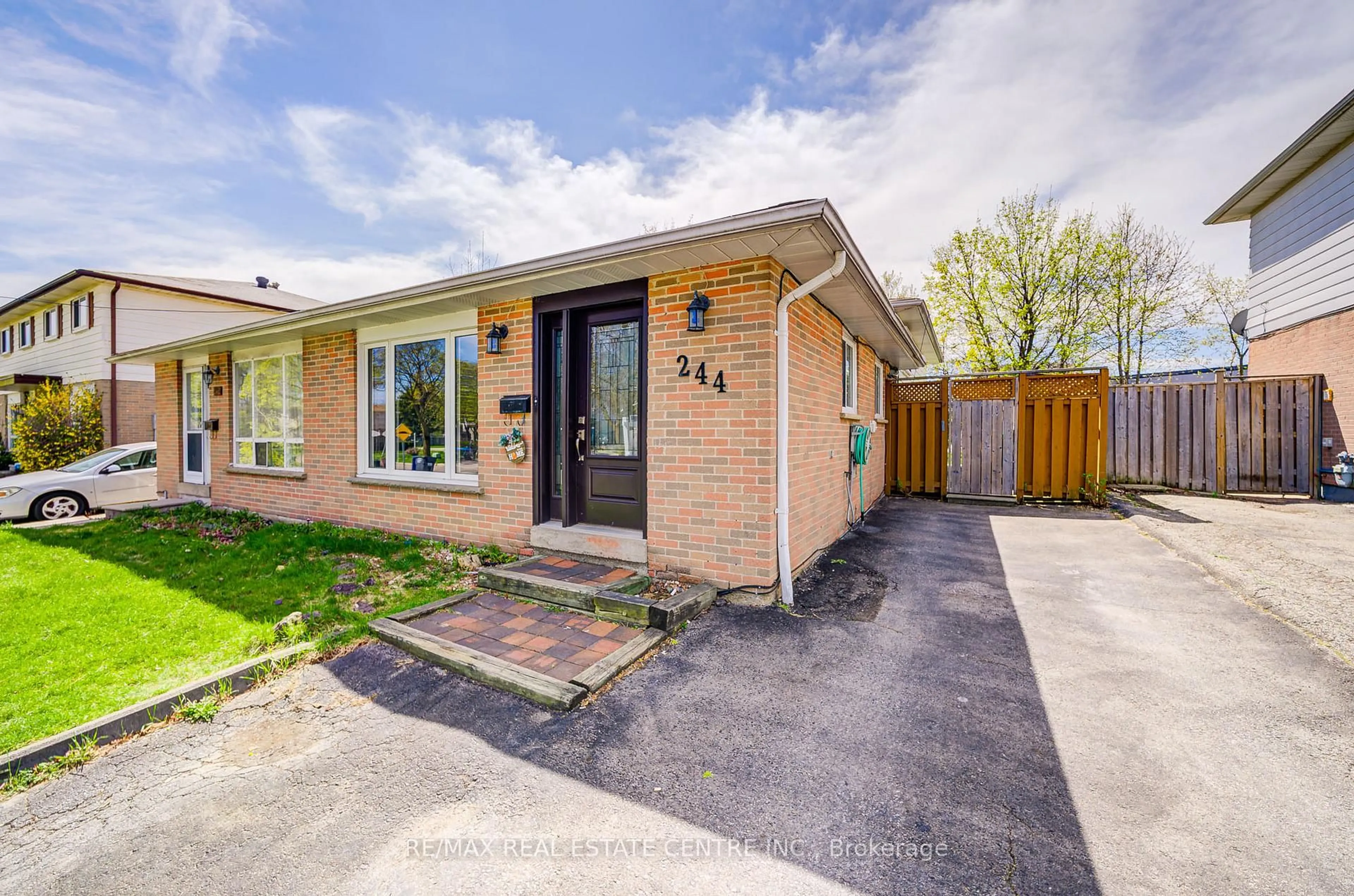 Home with brick exterior material, street for 244 Archdekin Dr, Brampton Ontario L6V 1Z2