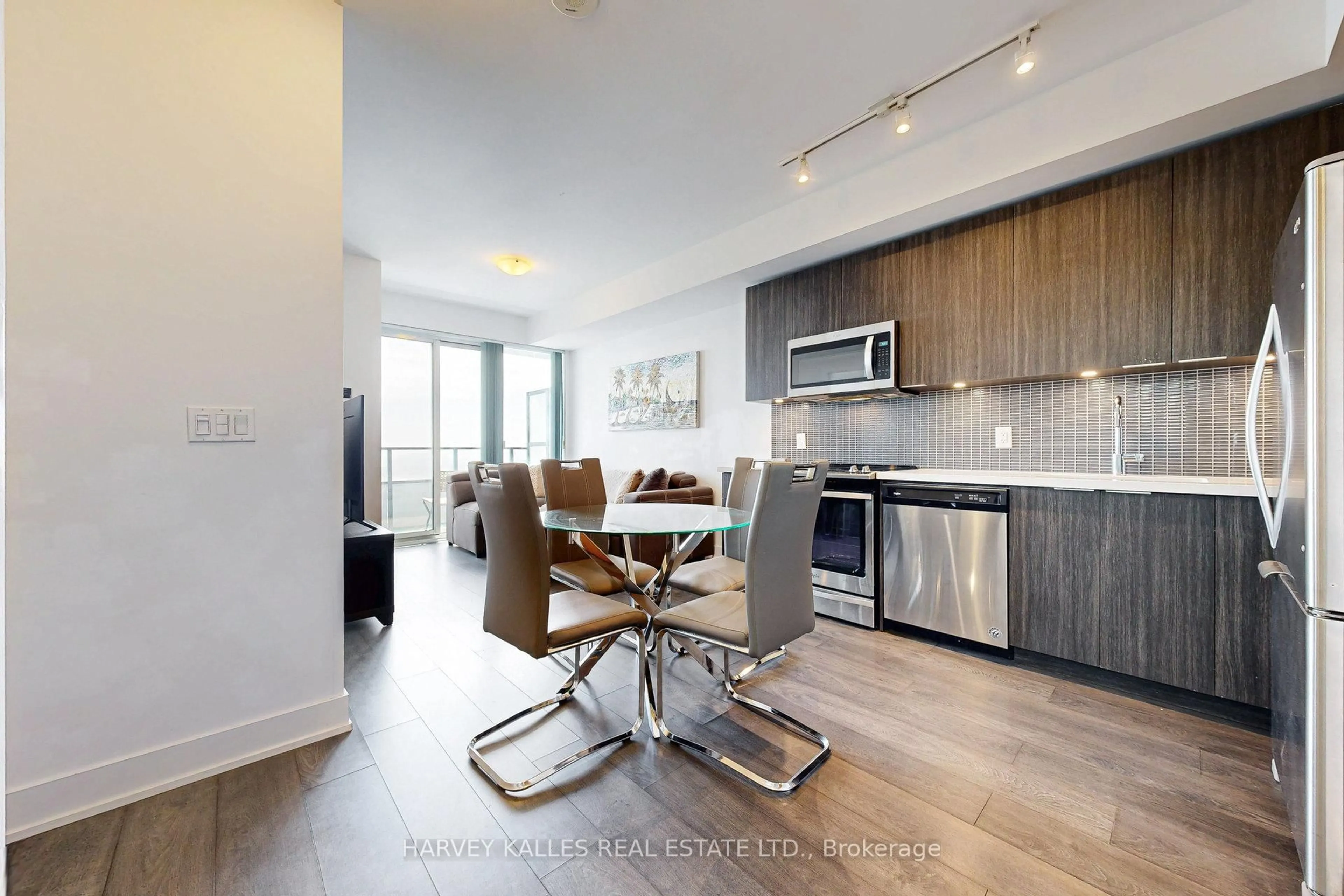 Open concept kitchen, wood/laminate floor for 30 Shore Breeze Dr #4519, Toronto Ontario M8V 0J1