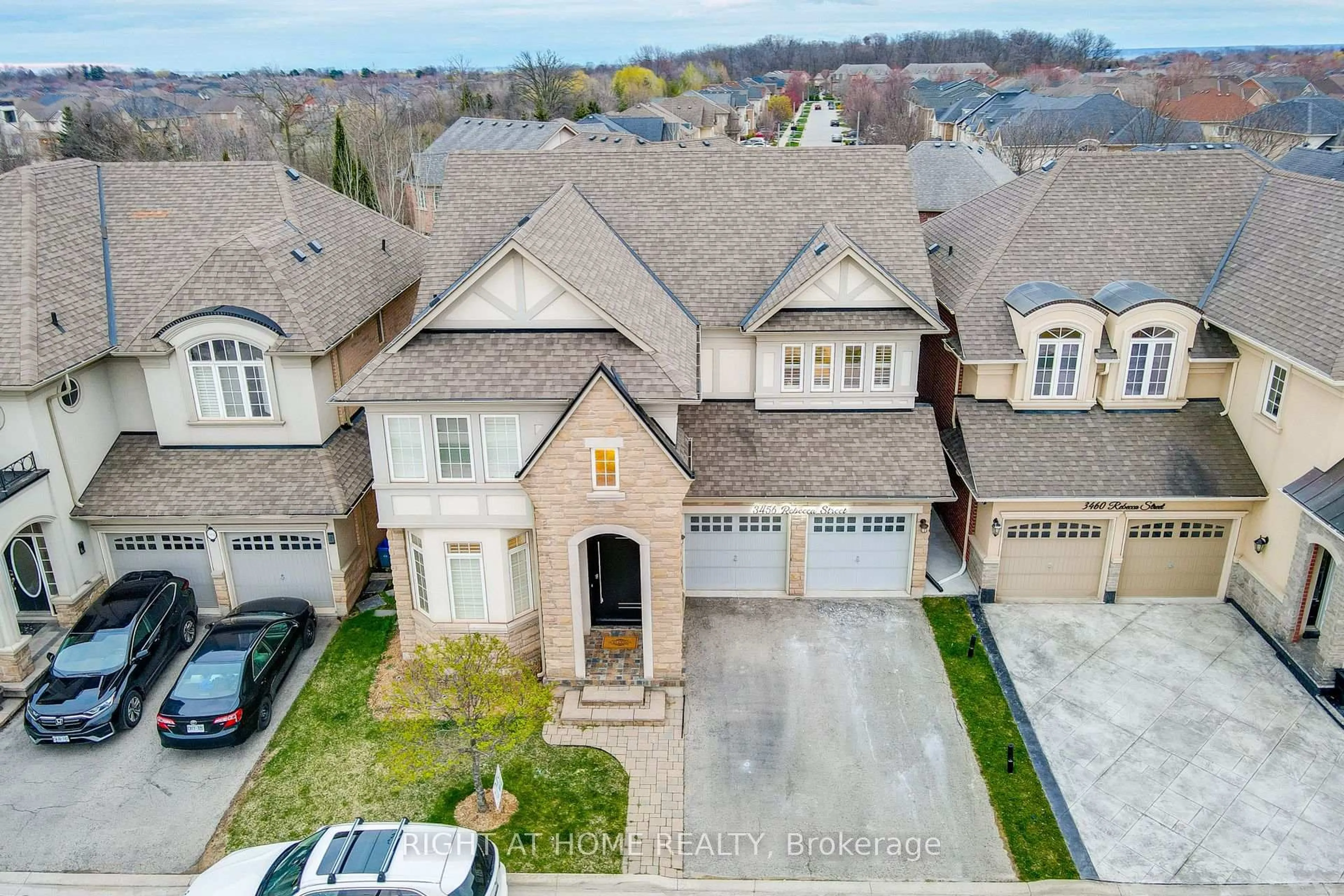 A pic from outside/outdoor area/front of a property/back of a property/a pic from drone, street for 3456 Rebecca St, Oakville Ontario L6L 6X9