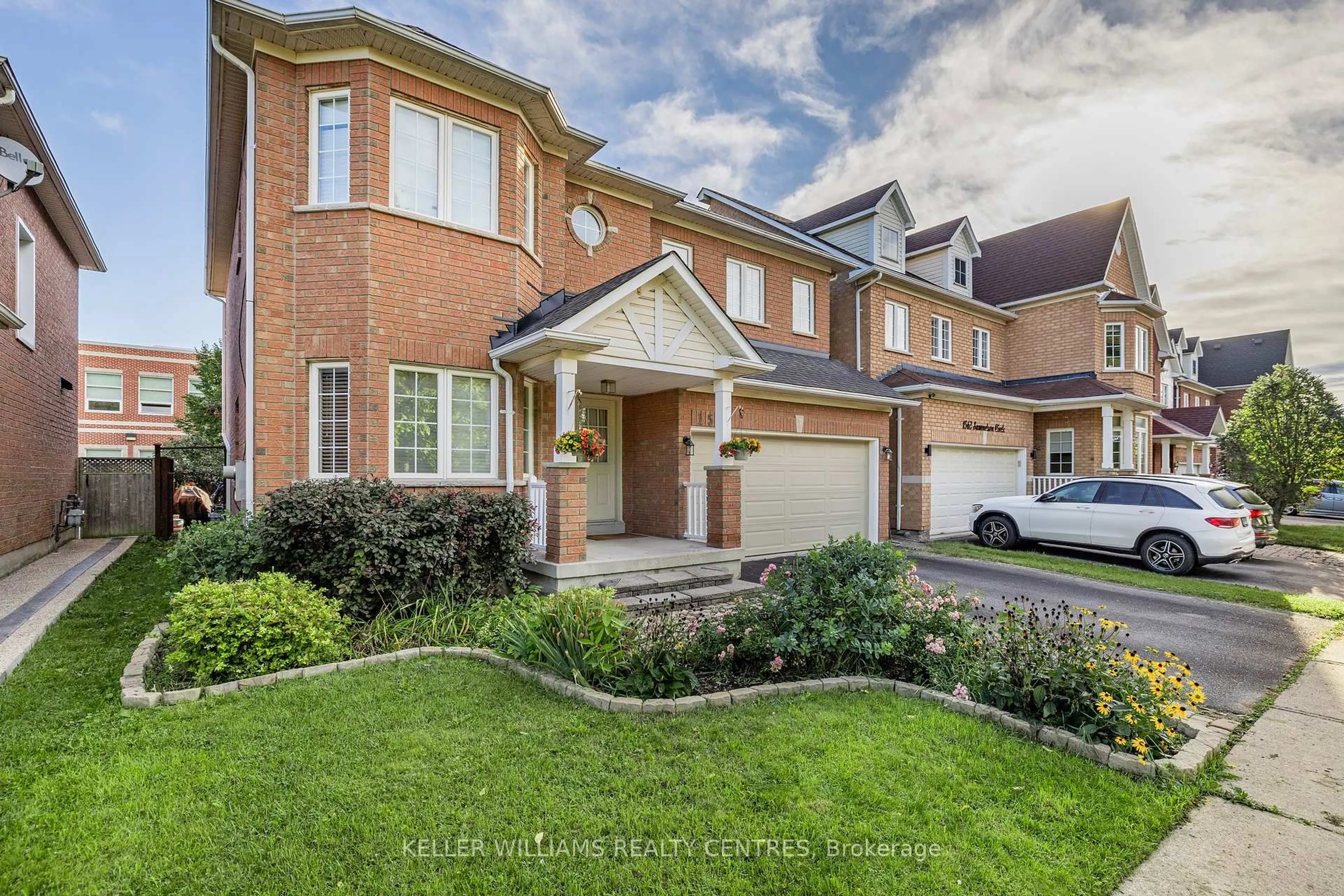 Home with brick exterior material, street for 1567 Samuelson Circ, Mississauga Ontario L5N 8A2