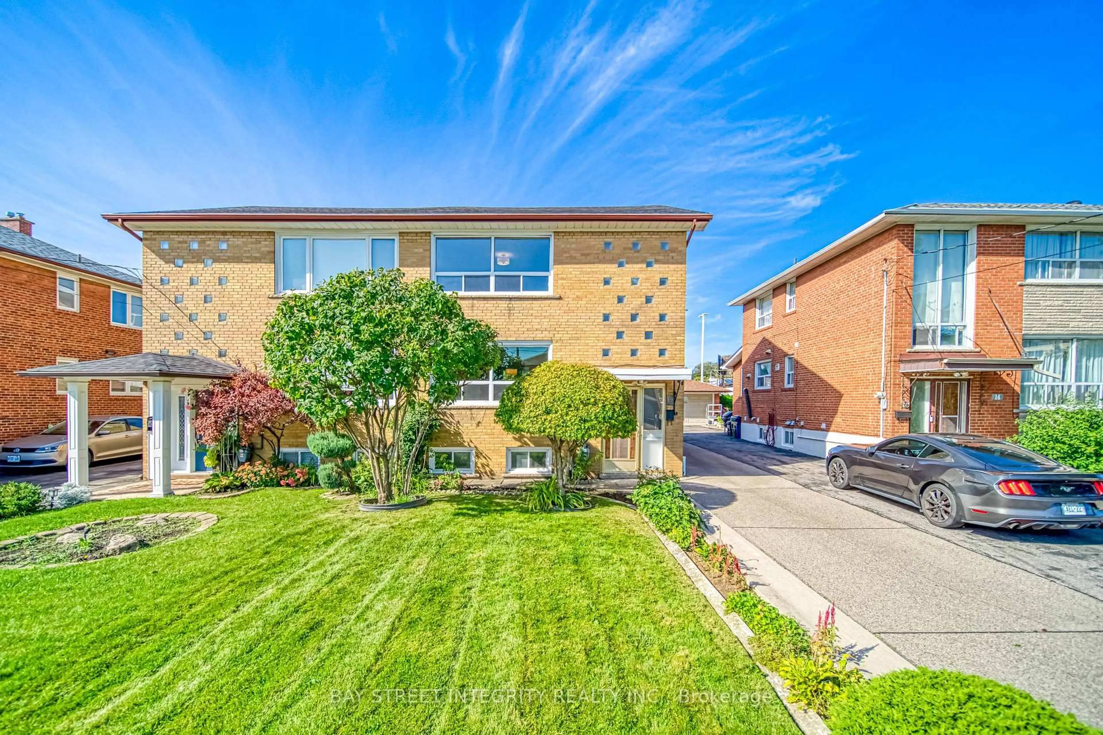 A pic from outside/outdoor area/front of a property/back of a property/a pic from drone, street for 12 Martini Dr, Toronto Ontario M6M 4X5