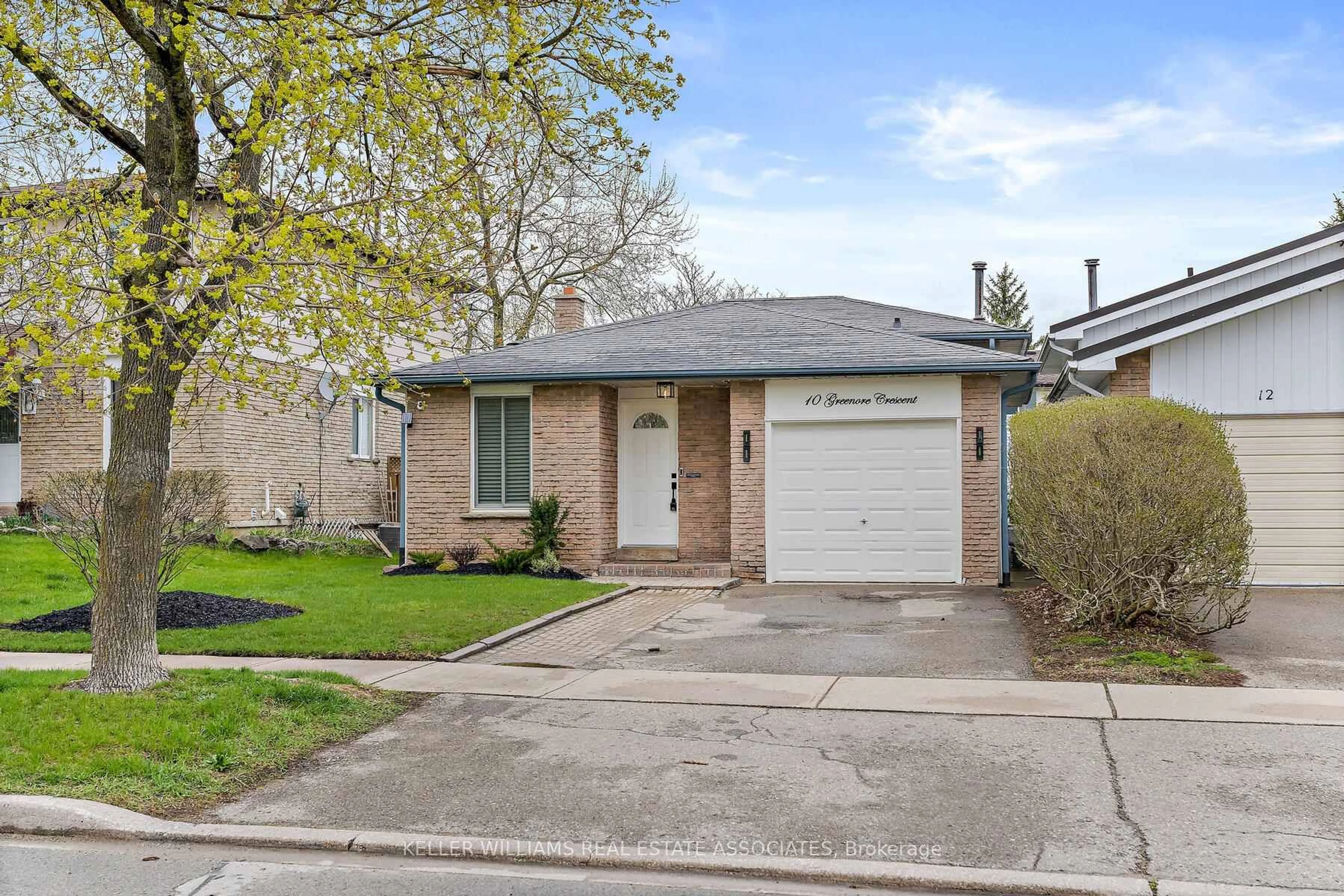 Home with brick exterior material, street for 10 Greenore Cres, Halton Hills Ontario L7J 2T2