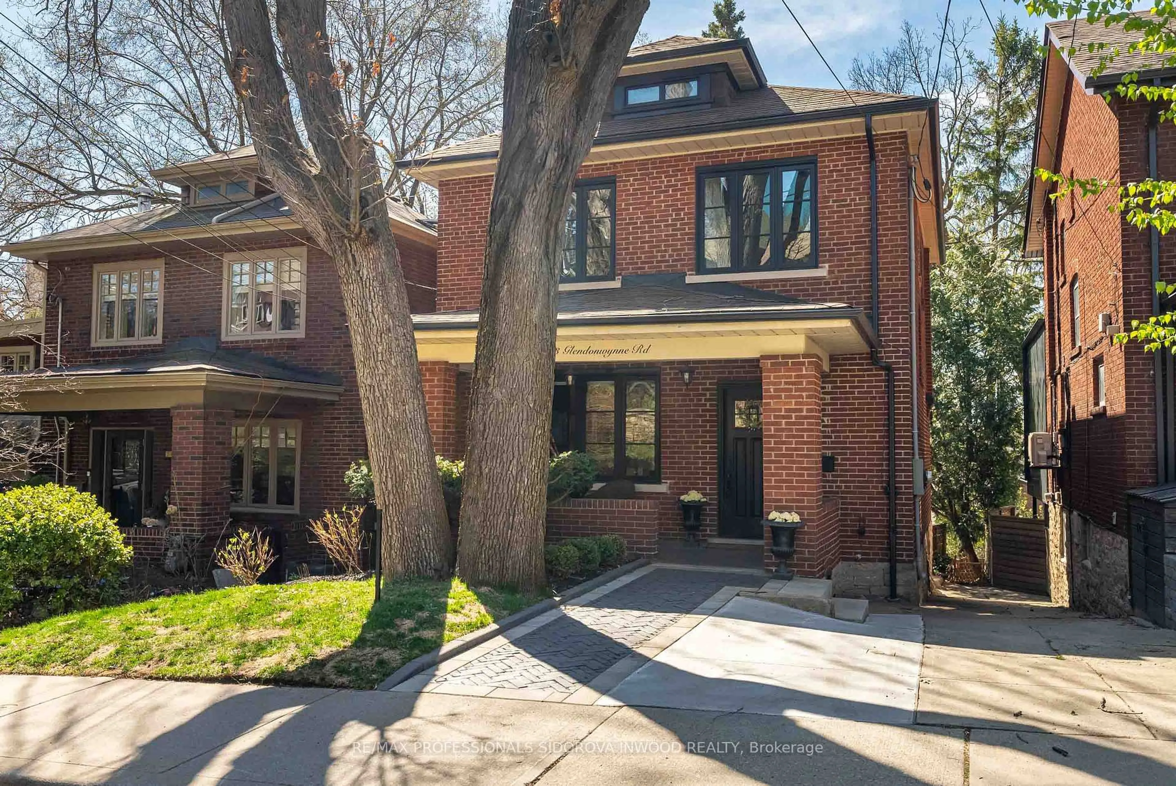 Home with brick exterior material, street for 203 Glendonwynne Rd, Toronto Ontario M6P 3E9